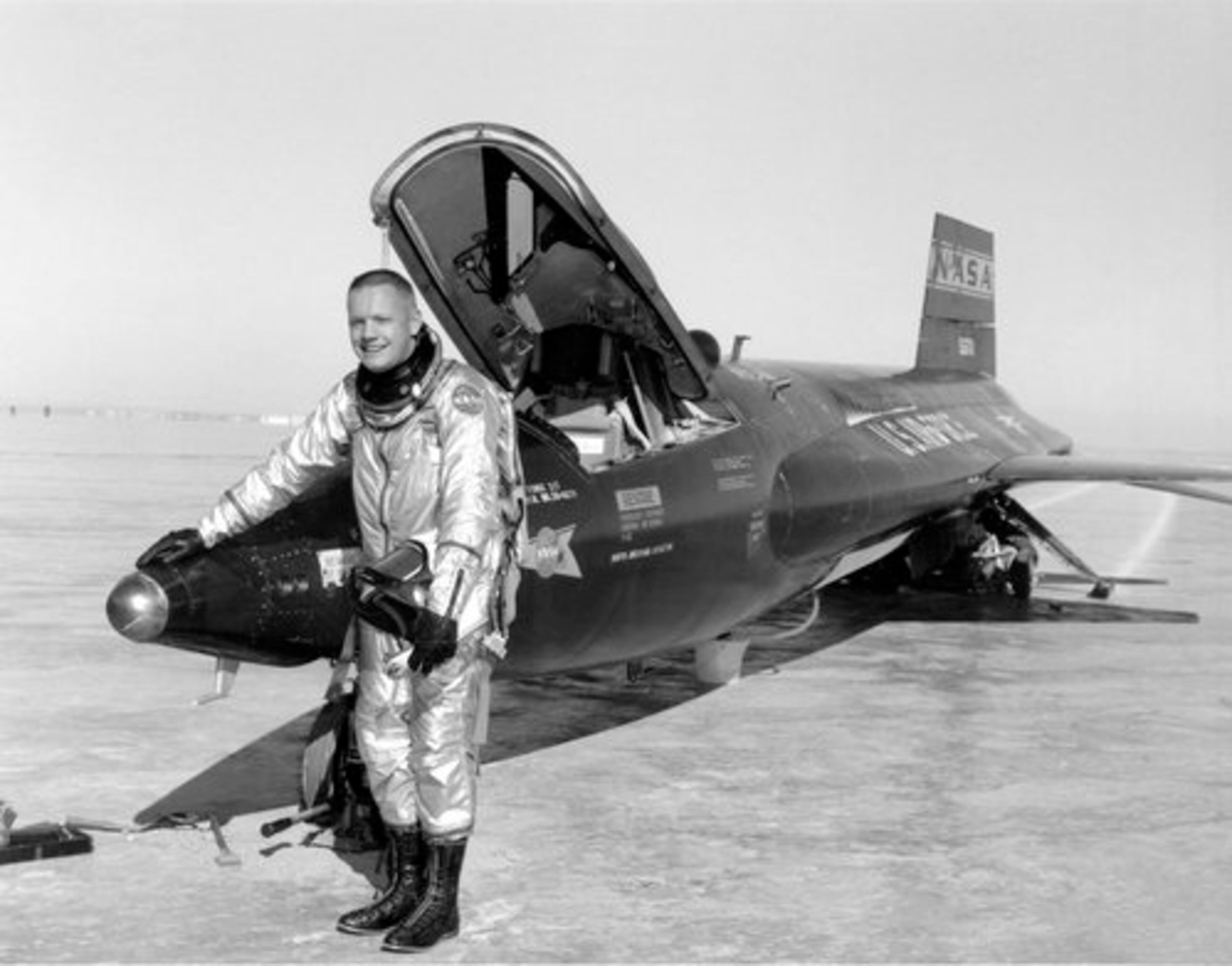 An undated NASA handout photo of Neil Armstrong with an X-15 aircraft at the Dryden Flight Research Center in California.