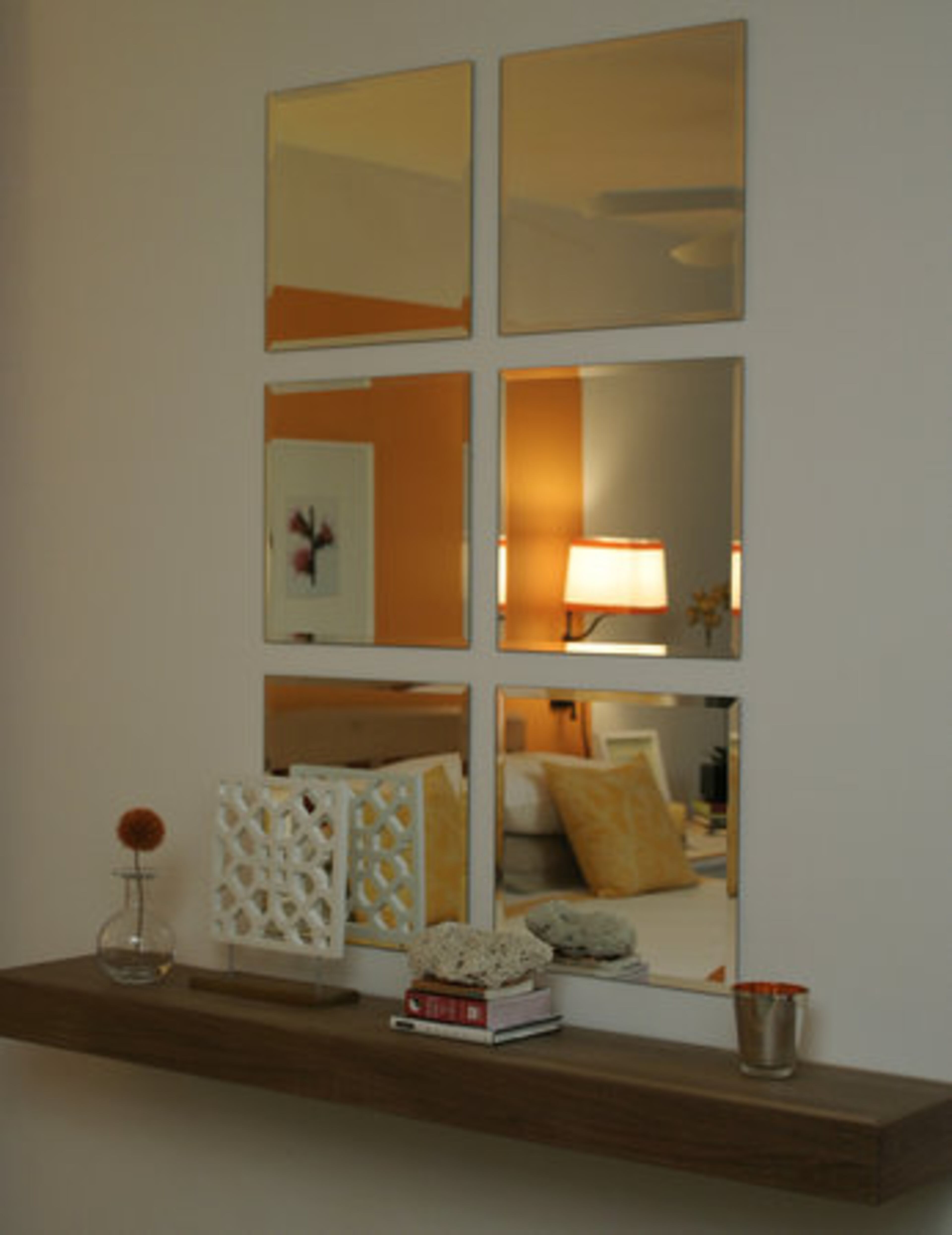 Kim Mills used mirrors to show off the guest room's vivid colors.