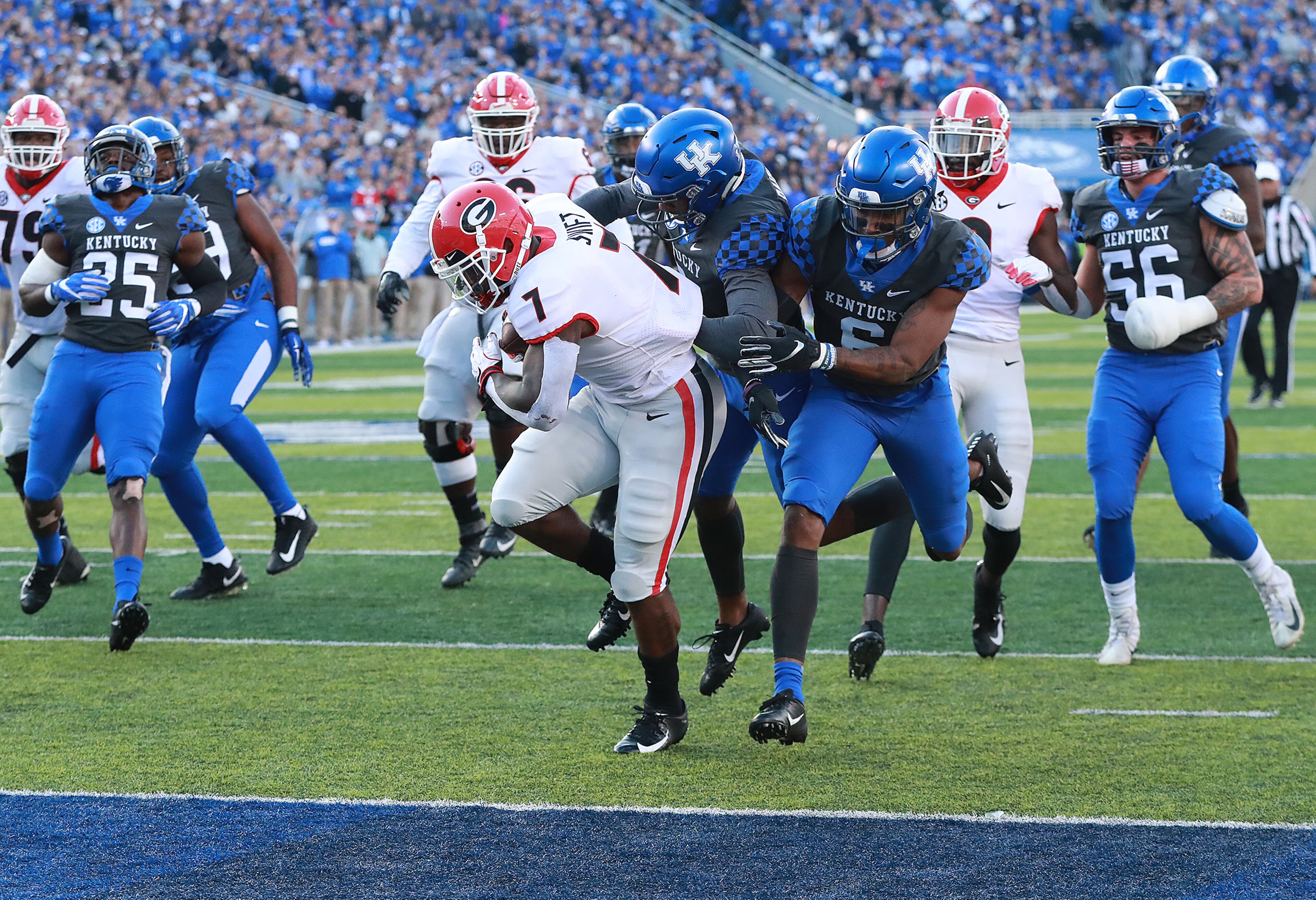 Nov 3, 2018 Lexington: Georgia tailback D'Andre Swift breaks a run for a touchdown and a 14-3 lead over Kentucky during the second quarter in a NCAA college football game on Saturday, Nov. 3, 2018, in Lexington. Curtis Compton/ccompton@ajc.com
