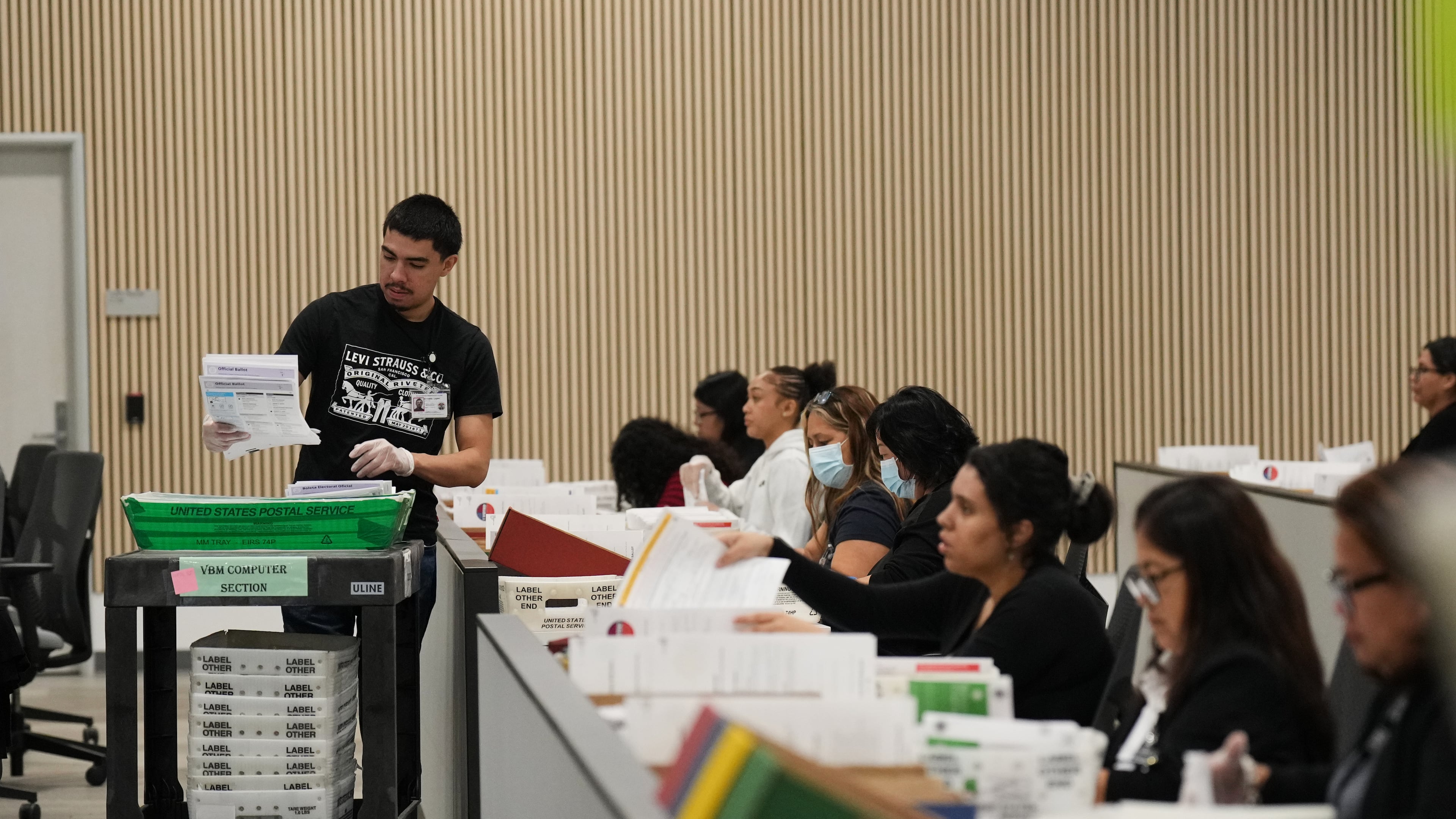 Ballots are inspected the day after California's primary election at the LA County Ballot Processing Center Wednesday, June 3, 2026, in City of Industry, Calif. (AP Photo/Jae C. Hong)