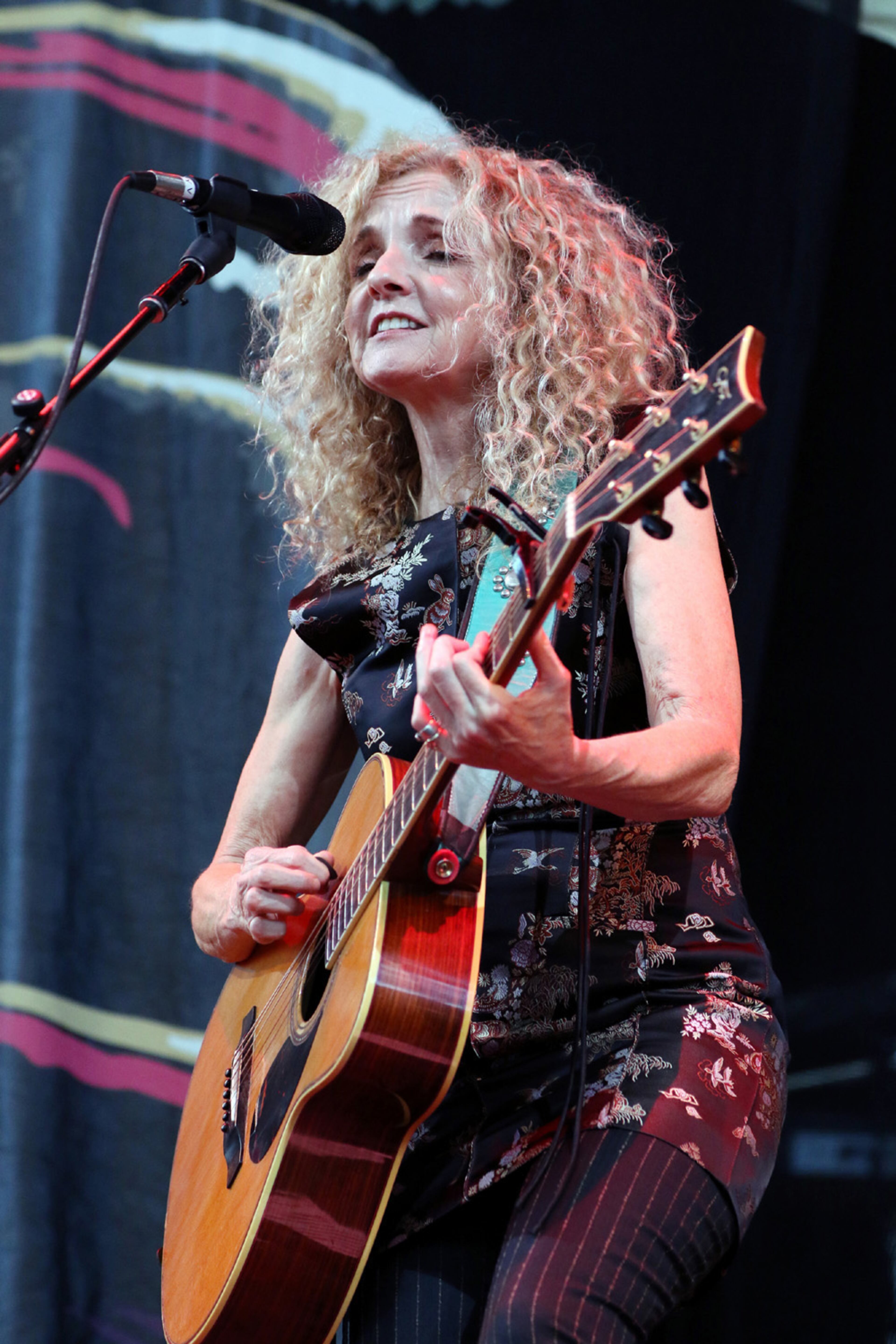 Patty Griffin performs as the opening act Saturday night, July 16, 2022, for the sold-out tour stop of The Chicks (formerly Dixie Chicks) at Ameris Bank Amphitheatre in Alpharetta. (Photo: Robb Cohen for The Atlanta Journal-Constitution)