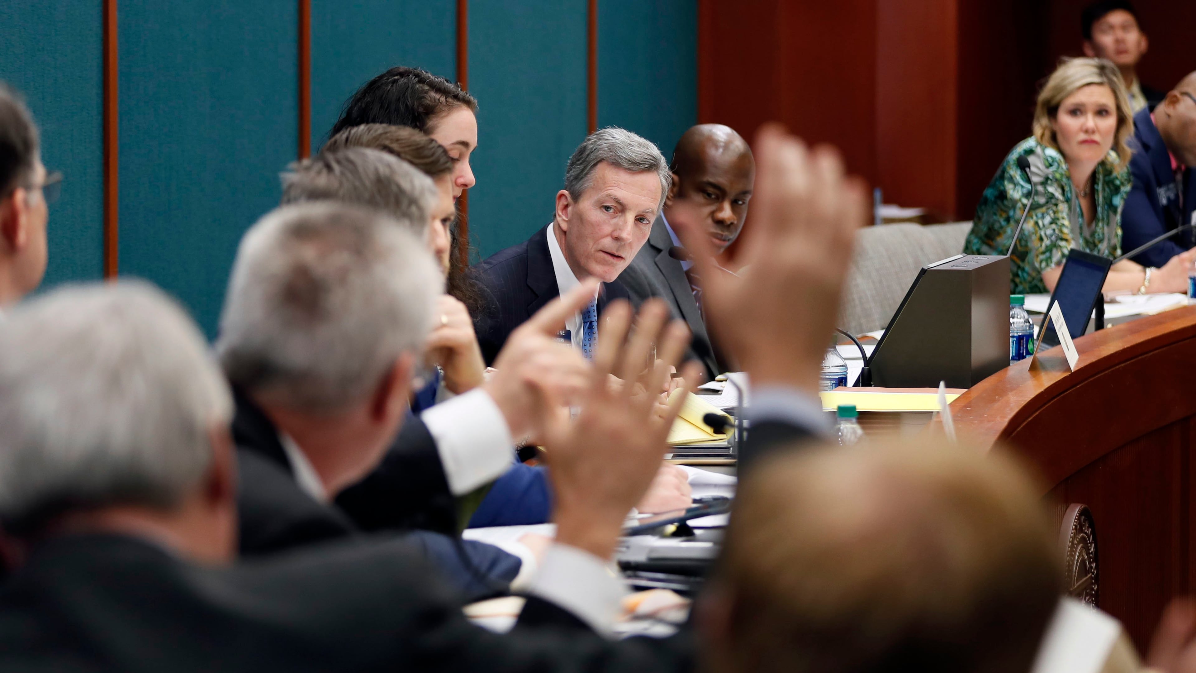 Senate Judiciary Chairman Jesse Stone counts votes during a hearing on a bill to prohibit convicted domestic abusers from possessing firearms. The bill passed the committee unanimously. Bob Andres, bandres@ajc.com
