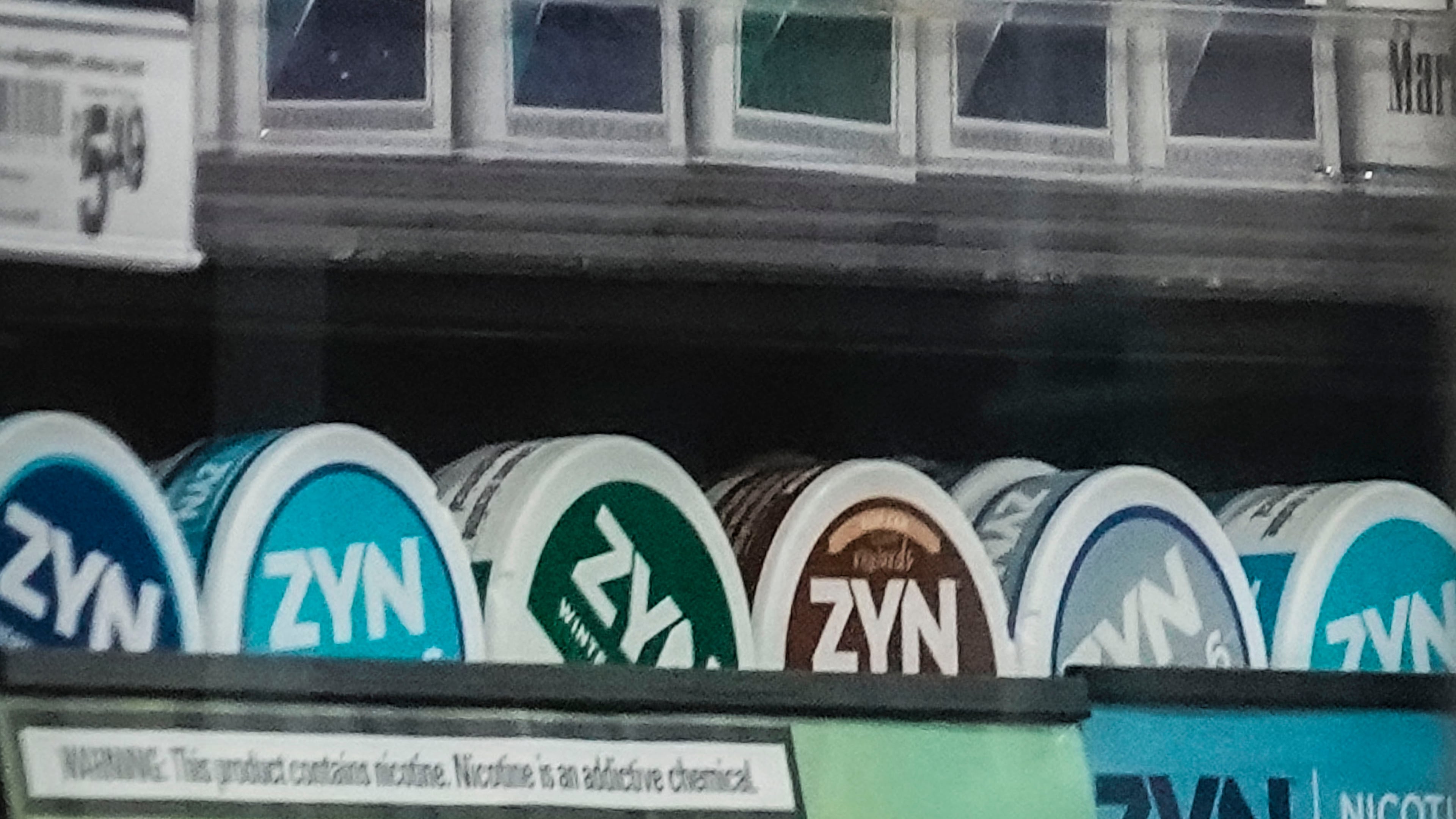 FILE - Containers of Zyn, a smokeless nicotine pouch, are displayed for sale among other nicotine and tobacco products at a newsstand on Feb. 23, 2024, in New York. (AP Photo/Bebeto Matthews, File)