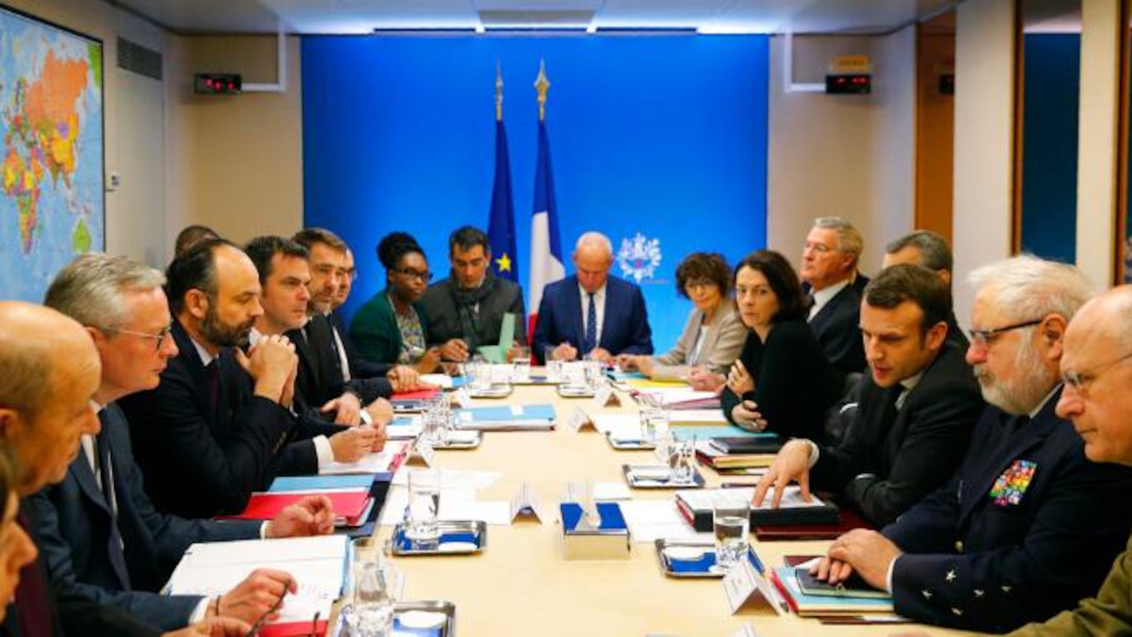 French President Emmanuel Macron, third right, chairs a meeting concerning the COVID-19 situation in France, Saturday, Feb. 29, 2020 in Paris.