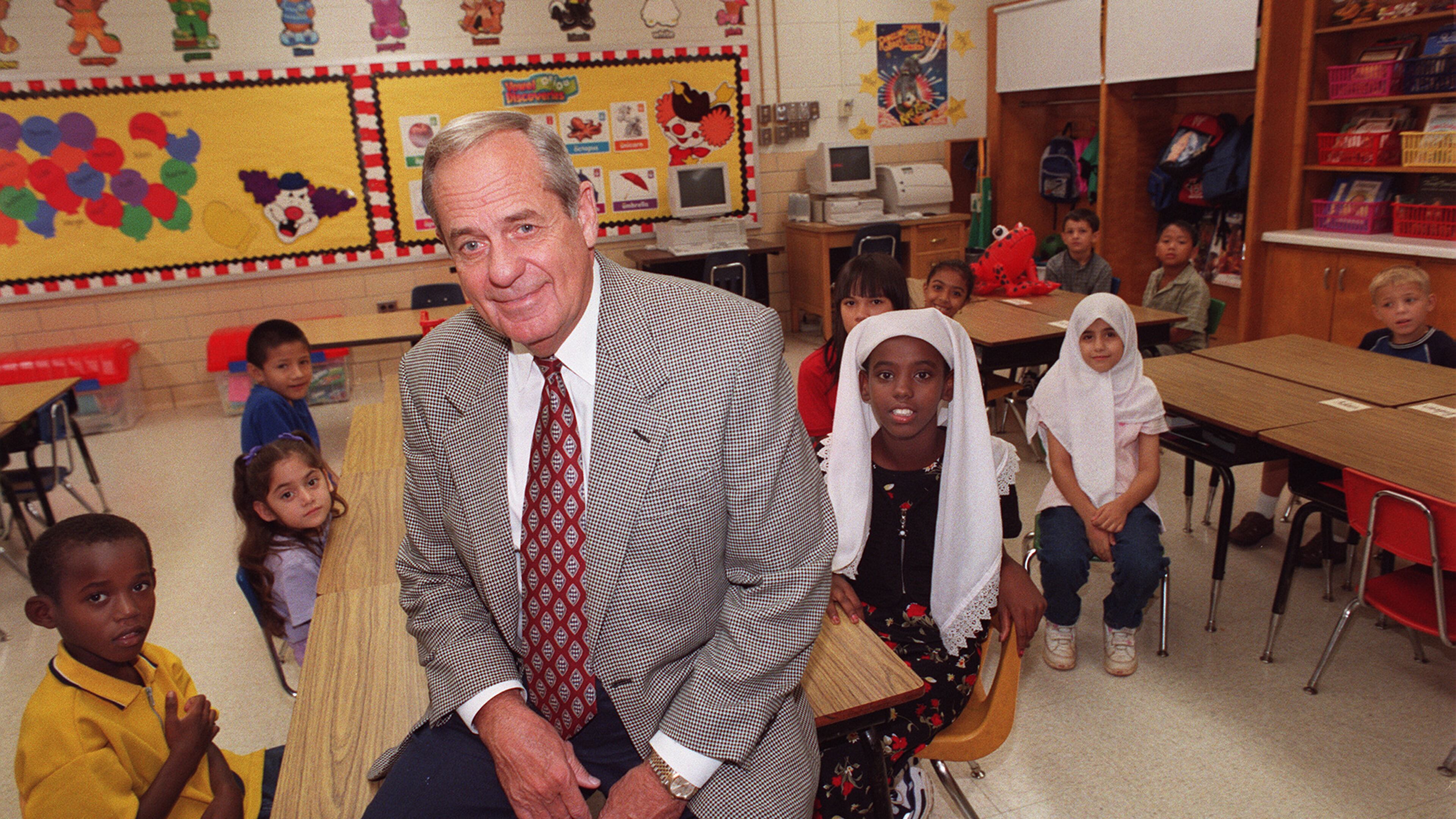 Former DeKalb County Superintendant James R. Hallford enjoyed visiting schools and talking with students. (File/AJC)