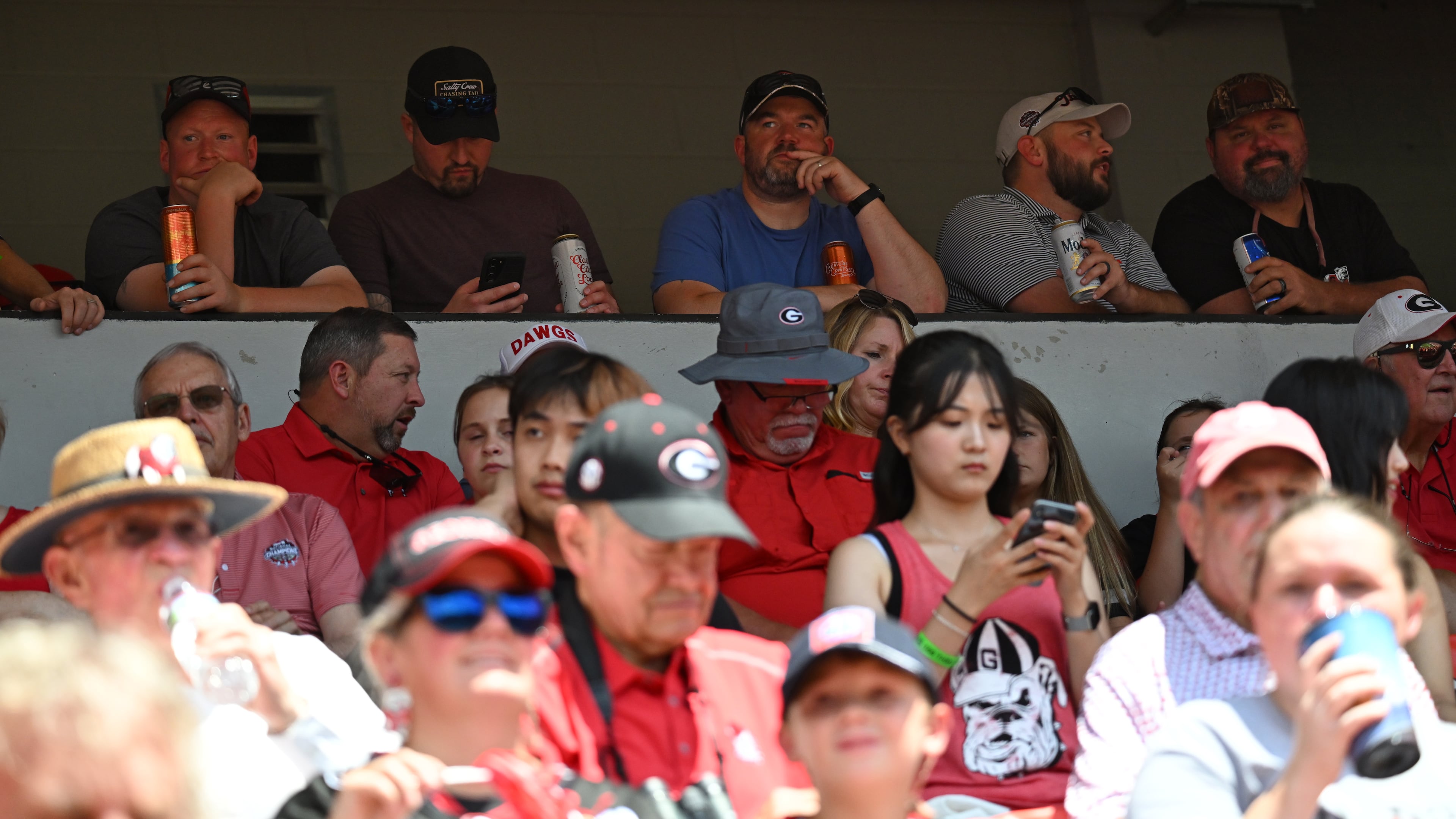 Georgia football fans enjoy their beers before Georgia’s home opener against Tennessee Tech at Sanford Stadium, Saturday, September 9, 2024, in Athens. (Hyosub Shin/AJC)