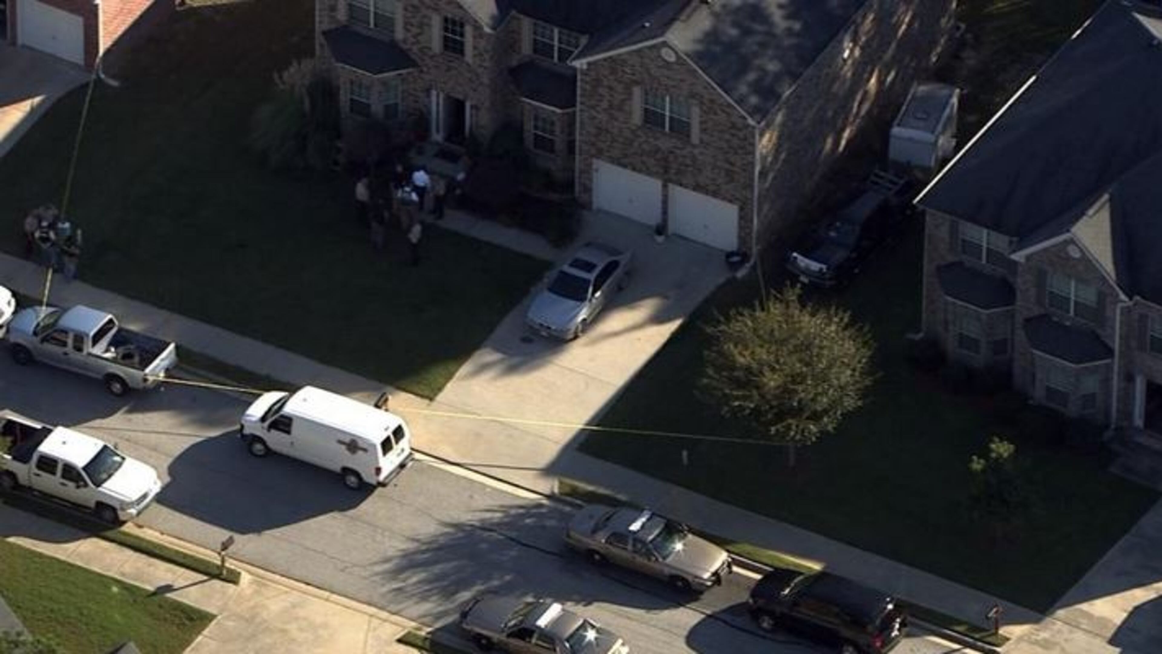 Authorities investigate a double homicide in Newton County on Thursday, Sept. 17, 2015. (Channel 2 Action News)