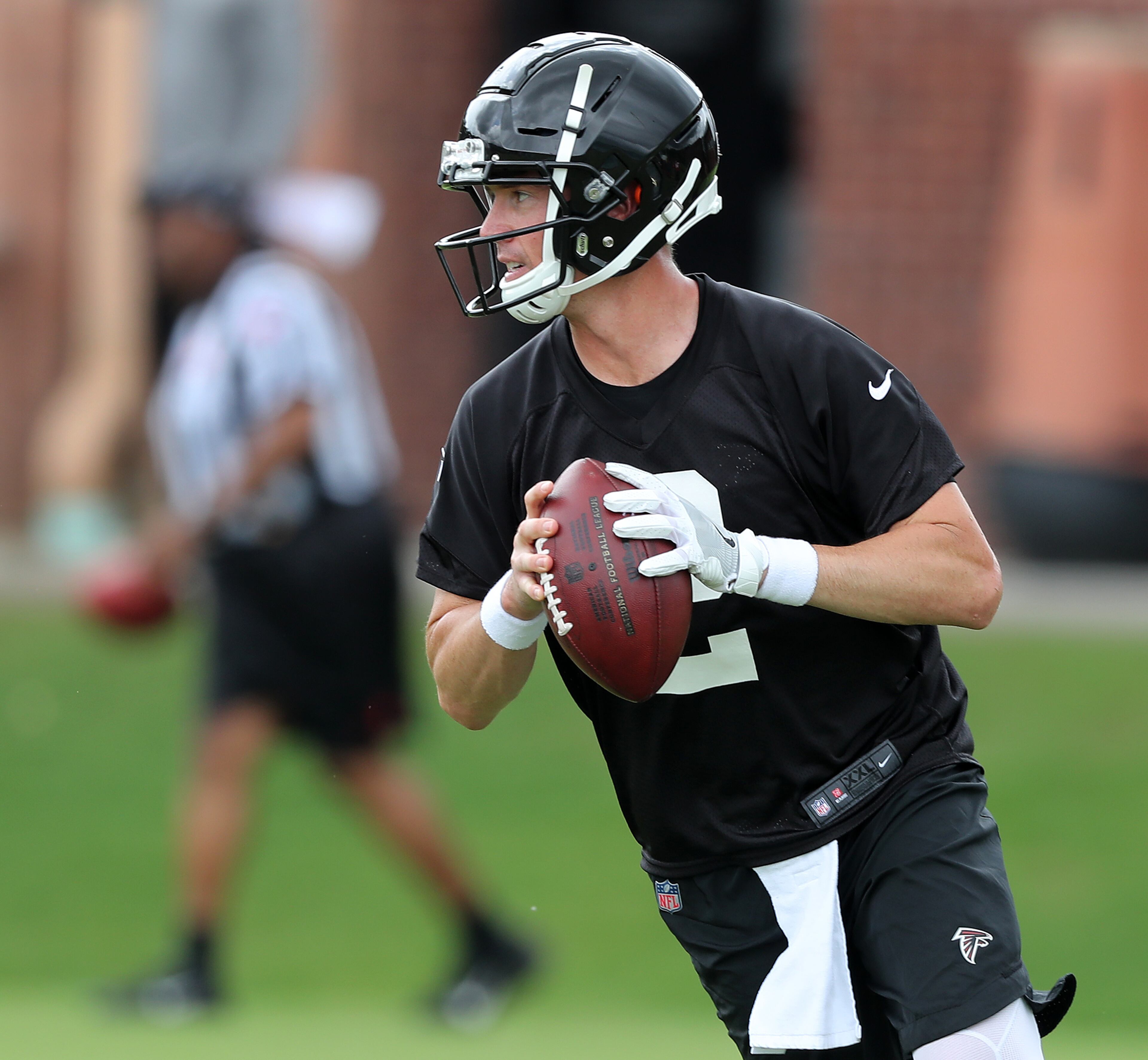 May 30, 2018 Flowery Branch: Atlanta Falcons quarterback Matt Ryan looks to pass during organized team activity on Wednesday, May 30, 2018, in Flowery Branch. Curtis Compton/ccompton@ajc.com