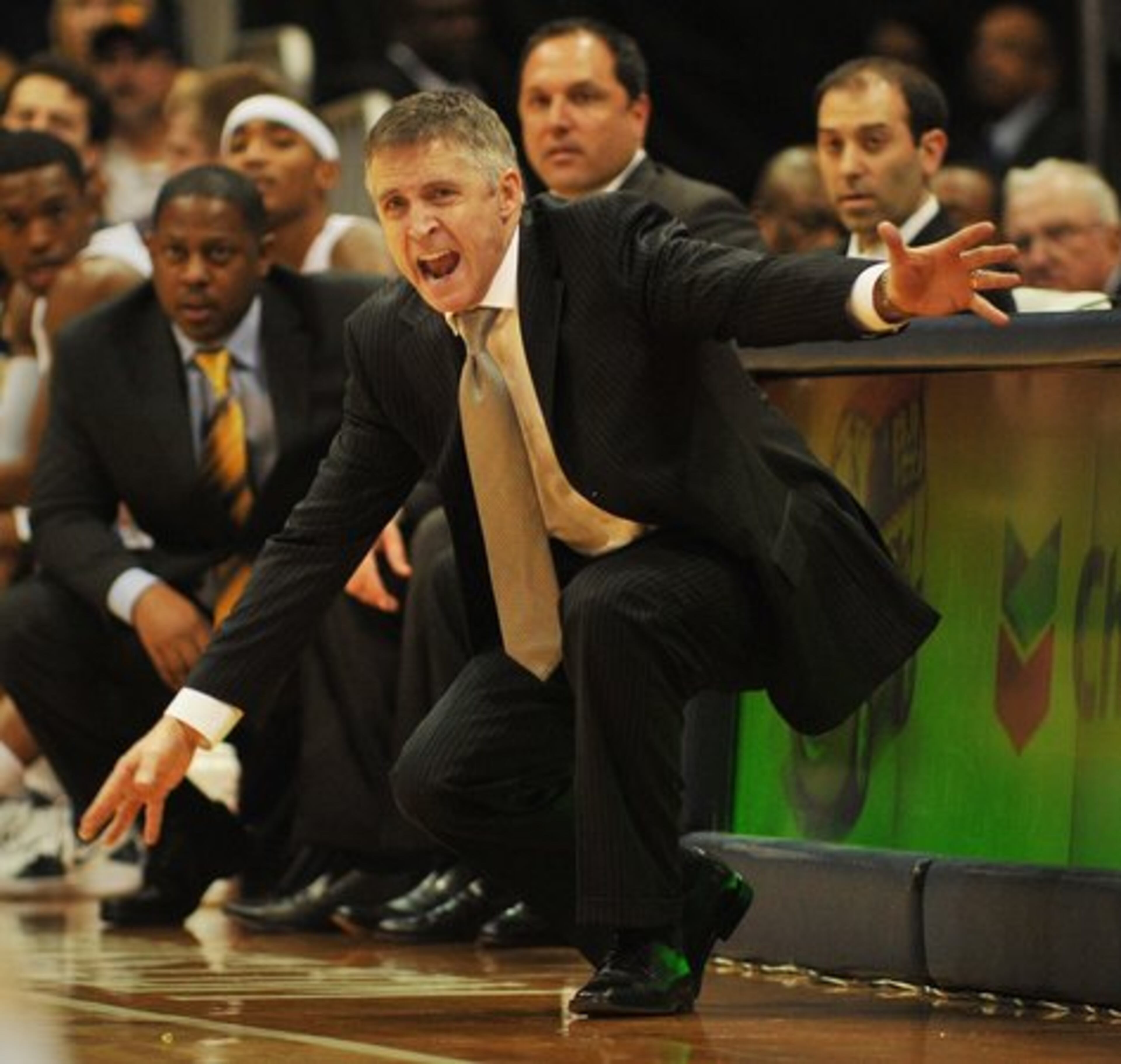Georgia Tech coach Brian Gregory yells instructions during the final minutes of the game.