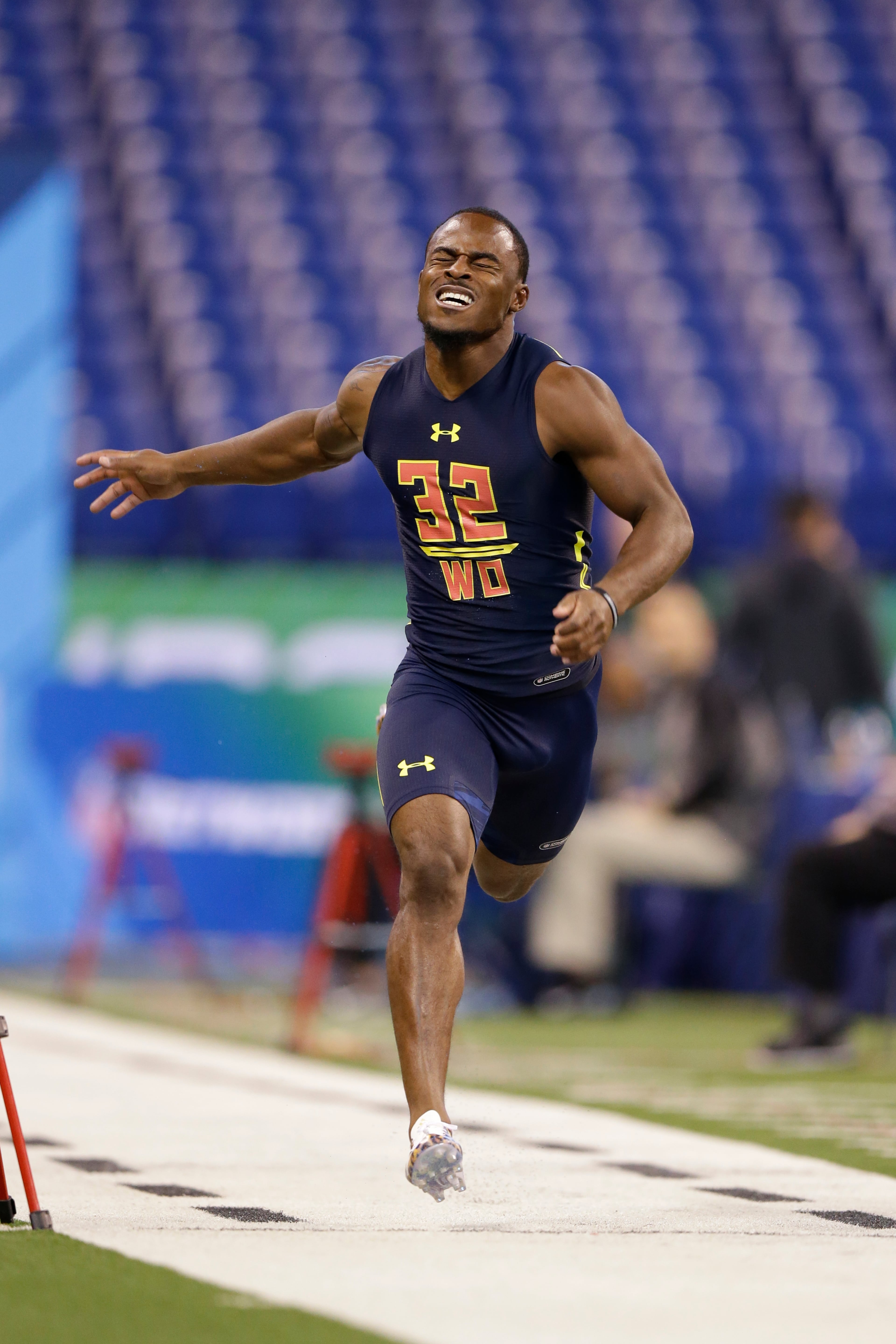 Georgia wide receiver Isaiah Mckenzie runs the 40-yard dash at the NFL football scouting combine in Indianapolis, Saturday, March 4, 2017. (AP Photo/Michael Conroy)