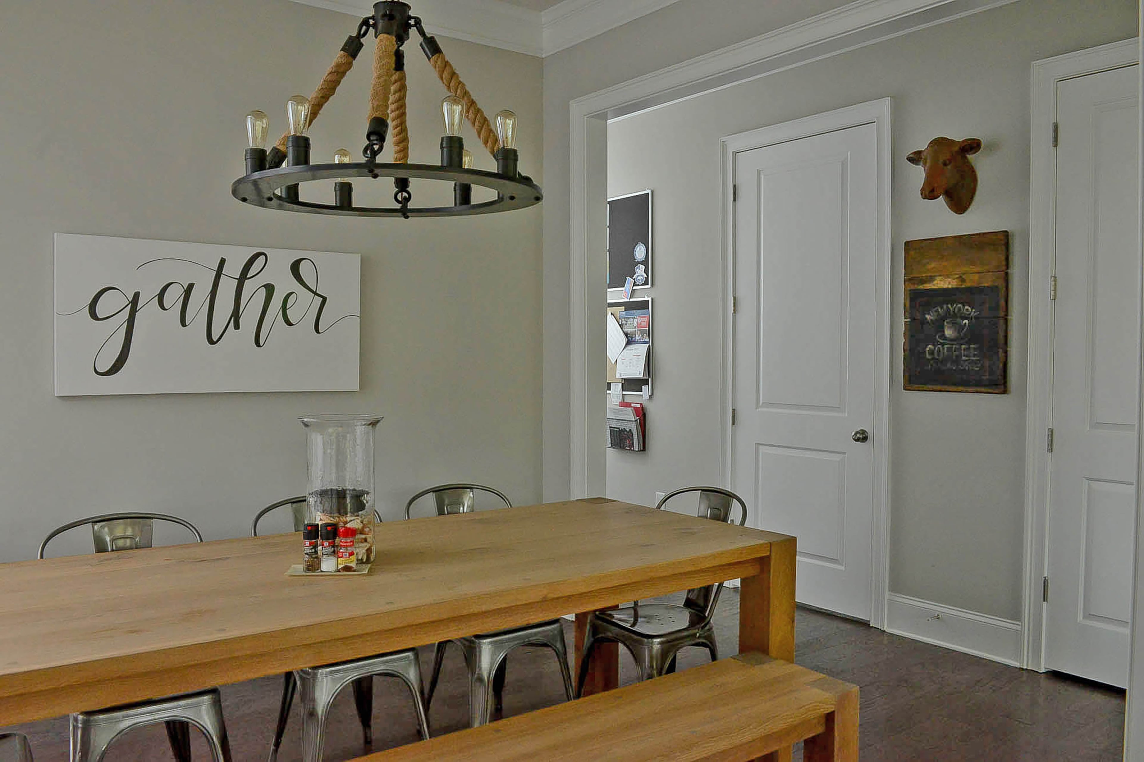 This Crate & Barrel table is Marcia Harvey's favorite piece of furniture. "There's always plenty of space to gather around that table," she said. Her interiors are transitional with urban flair, such as a steel industrial-inspired chandelier with filament bulbs and jute accents.