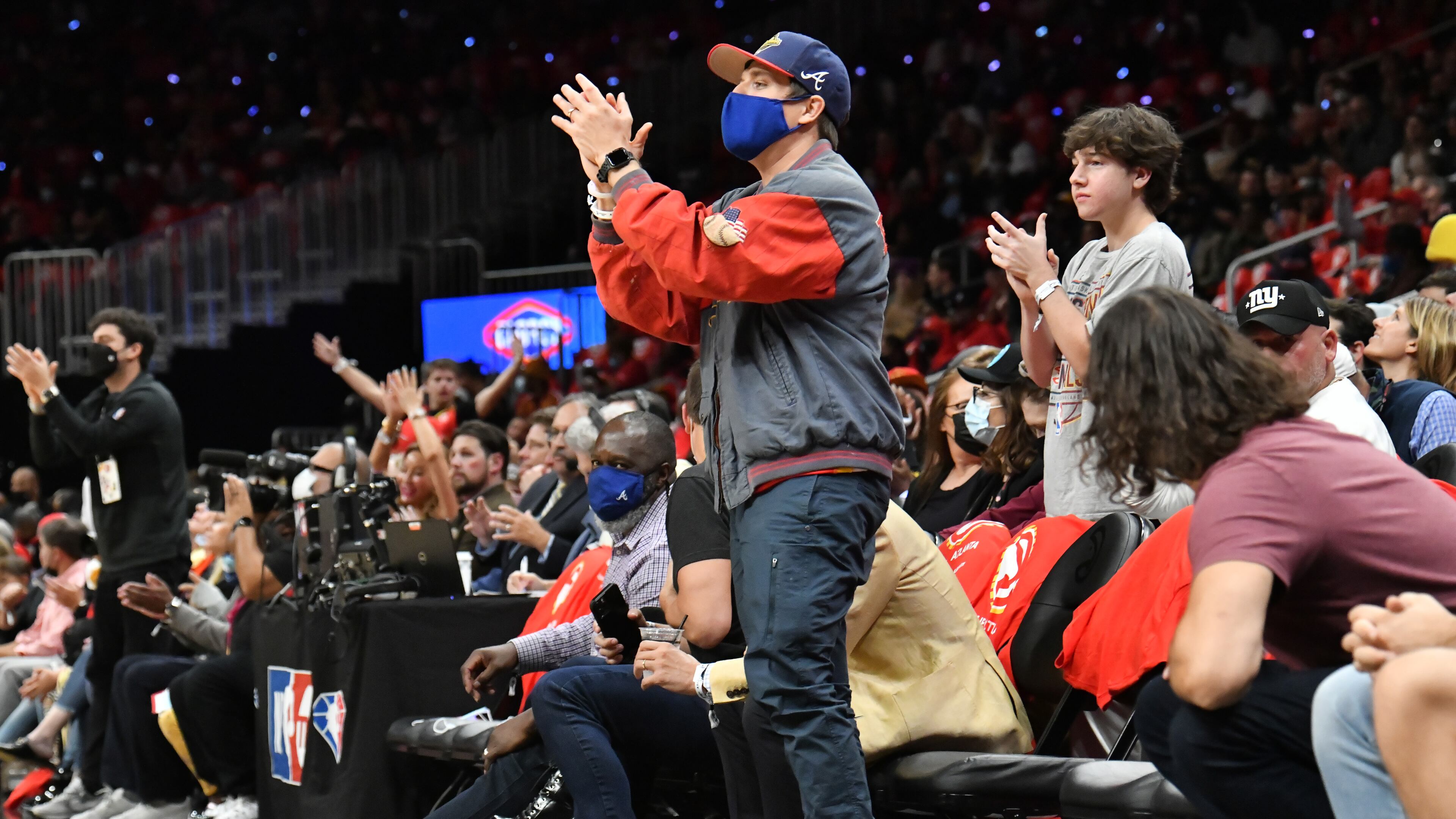 October 21, 2021 Atlanta - Atlanta Braves fan cheers during the first half of the home opener in a NBA basketball game at State Farm Arena on Thursday, October 21, 2021. (Hyosub Shin / Hyosub.Shin@ajc.com)