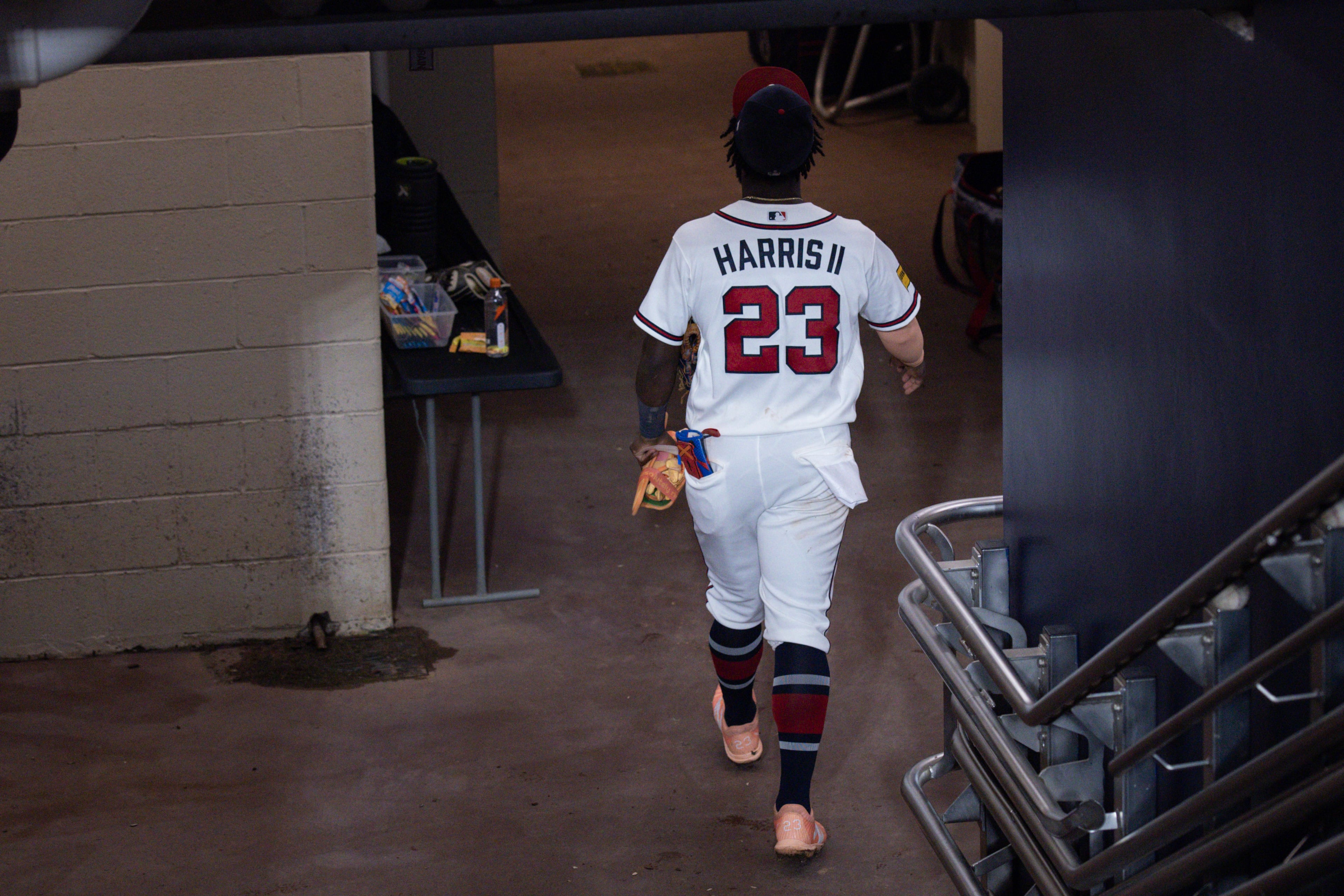 Atlanta Braves center fielder Michael Harris II (23) walks into the clubhouse after losing to the Los Angeles Dodgers in Game 4 of the MLB National League Division Series between the Atlanta Braves and the Los Angeles Dodgers, Wednesday, Oct. 7, 2026, in Atlanta. The Dodgers defeated the Braves 3 games to 1. (Miguel Martinez/AJC)