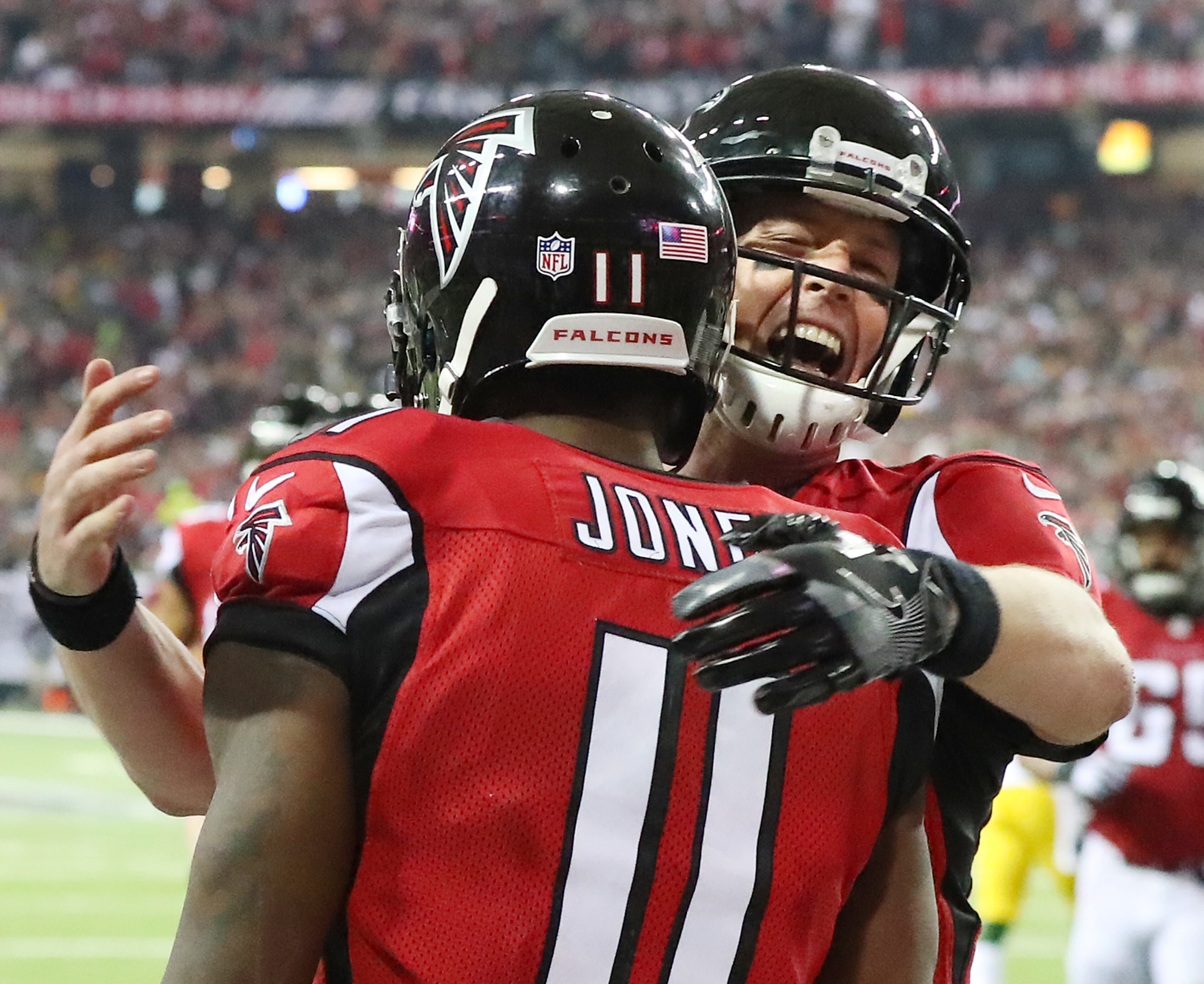 January 22, 2017, Atlanta: Matt Ryan celebrates with Julio Jones connecting for a 70-plus yard touchdown pass for a 31-0 lead over the Packers during the third quarter in the NFL football NFC Championship game on Sunday, Jan. 22, 2017, in Atlanta. Curtis Compton/ccompton@ajc.com