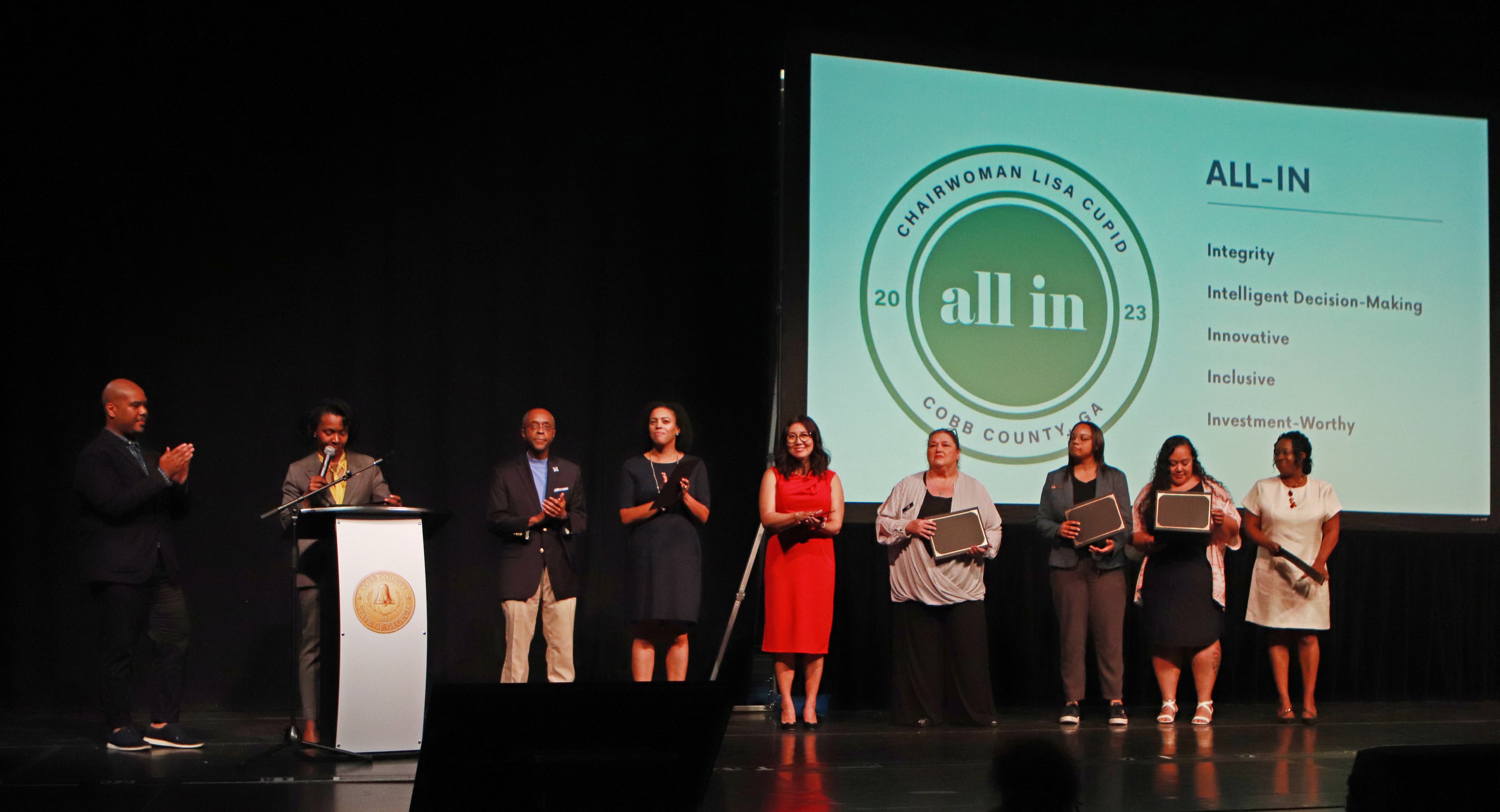 Cobb Chairwoman Lisa Cupid presents awards of recognition during the Cobb State of the County address on Thursday, May 4, 2023, at the Jennie T. Anderson Theatre in Marietta, Georgia. Cupid and other members of the Cobb government spoke to attendees at the event. CHRISTINA MATACOTTA FOR THE ATLANTA JOURNAL-CONSTITUTION.