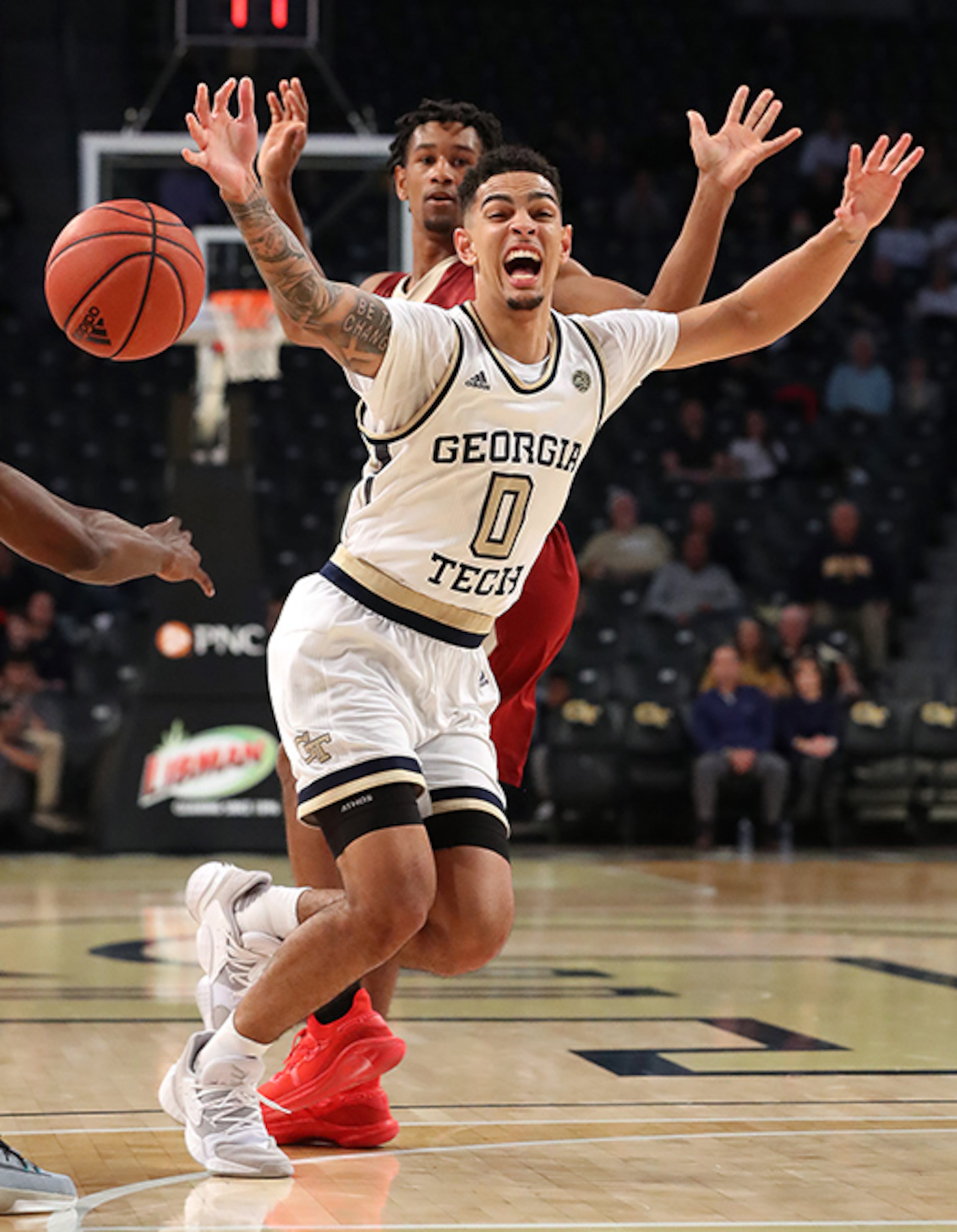 Georgia Tech guard Michael Devoe collides with Eon guard Hunter McIntosh on his way to the basket Monday, Nov. 11, 2019, at McCamish Pavilion in Atlanta.