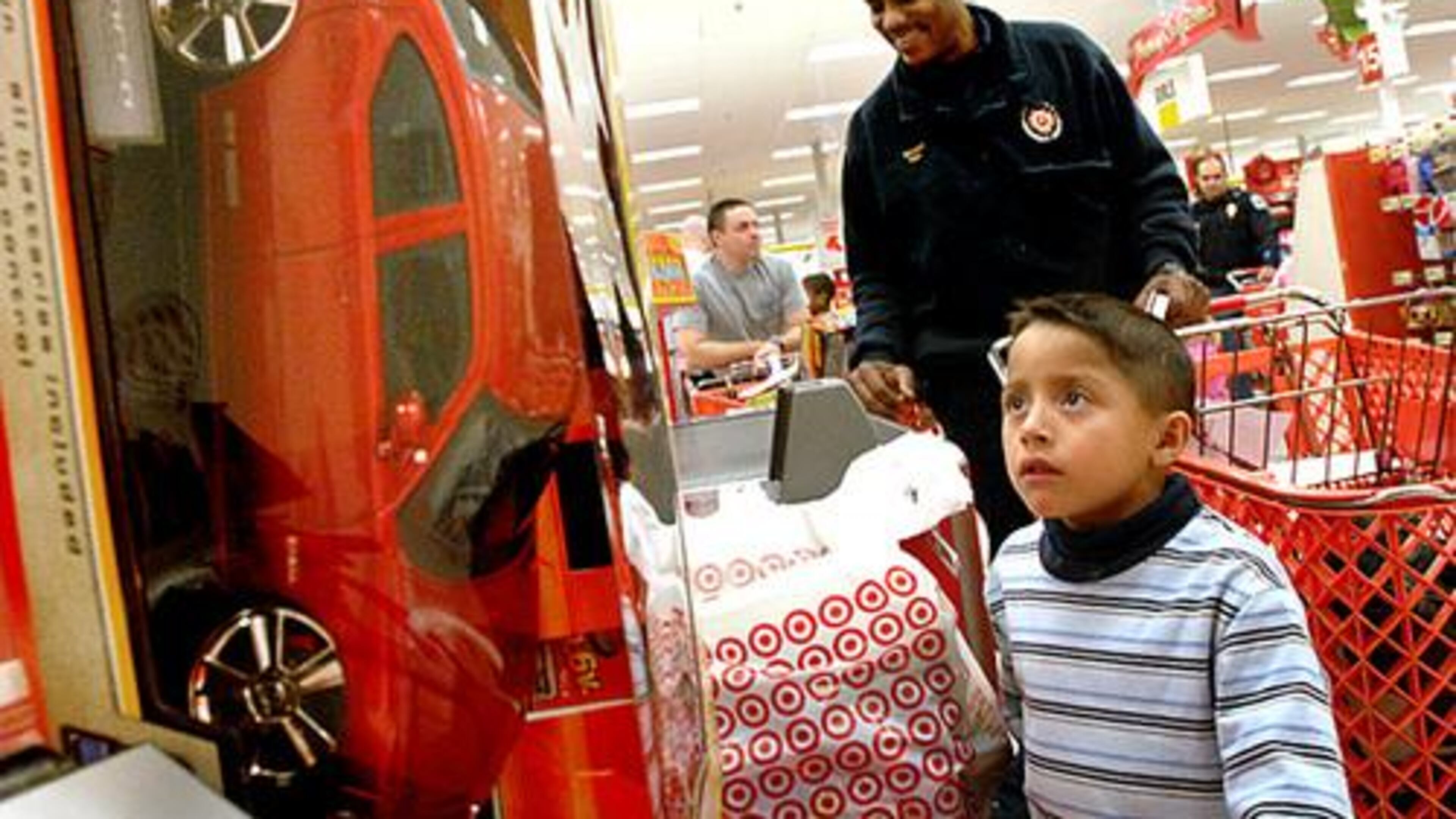 For free, certain Cobb children will go Christmas shopping with Cobb Police officers - thanks to the Cops & Kids Fundraiser Golf Tournament on Sept. 16. Also, funds will be used to pay all of the balances for the reduced lunch program in the Cobb County School District. AJC file photo