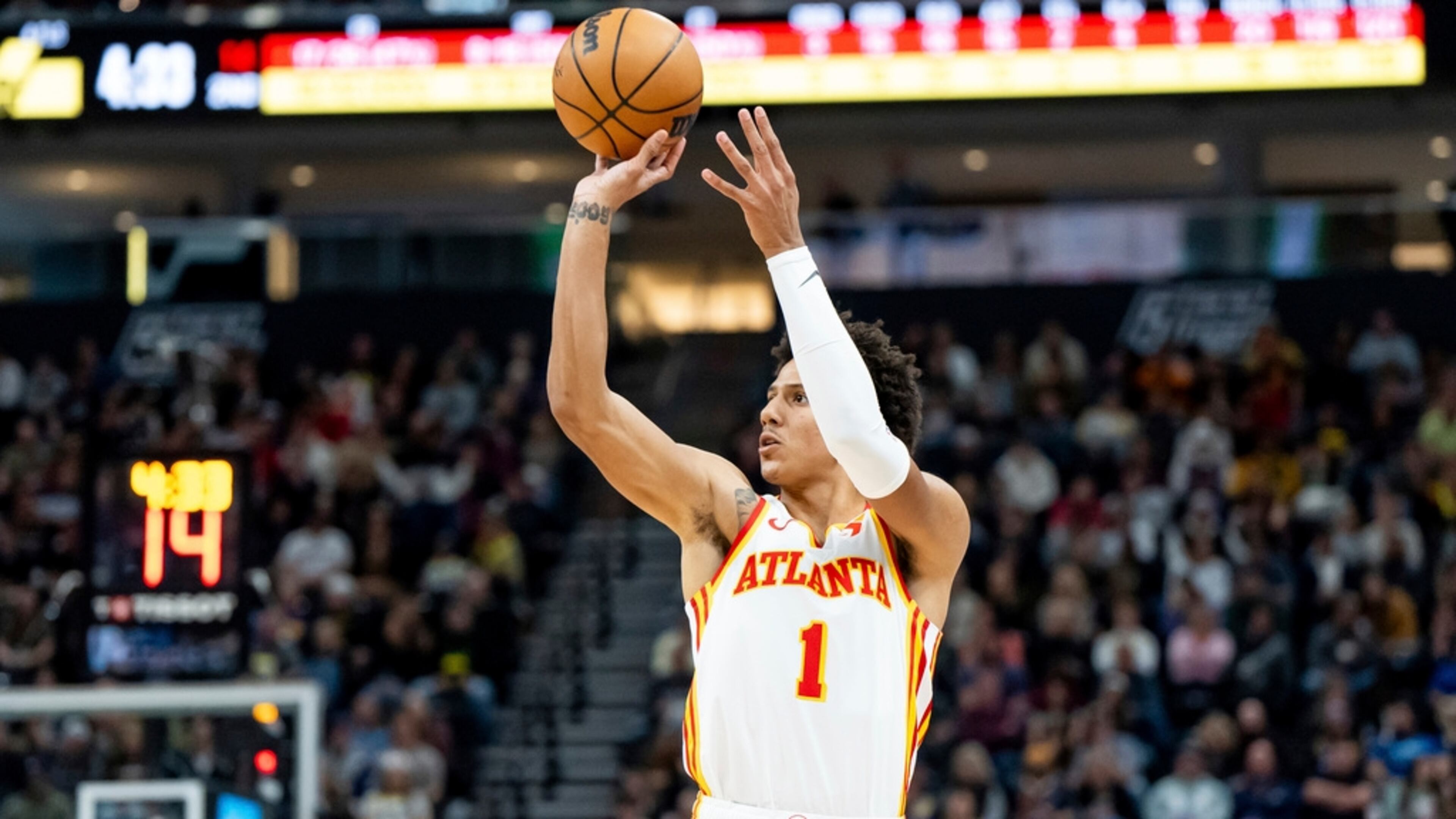 Atlanta Hawks forward Jalen Johnson (1) shoots during the first half of an NBA basketball game against the Utah Jazz, Friday, March 15, 2024, in Salt Lake City. (AP Photo/Spenser Heaps)
