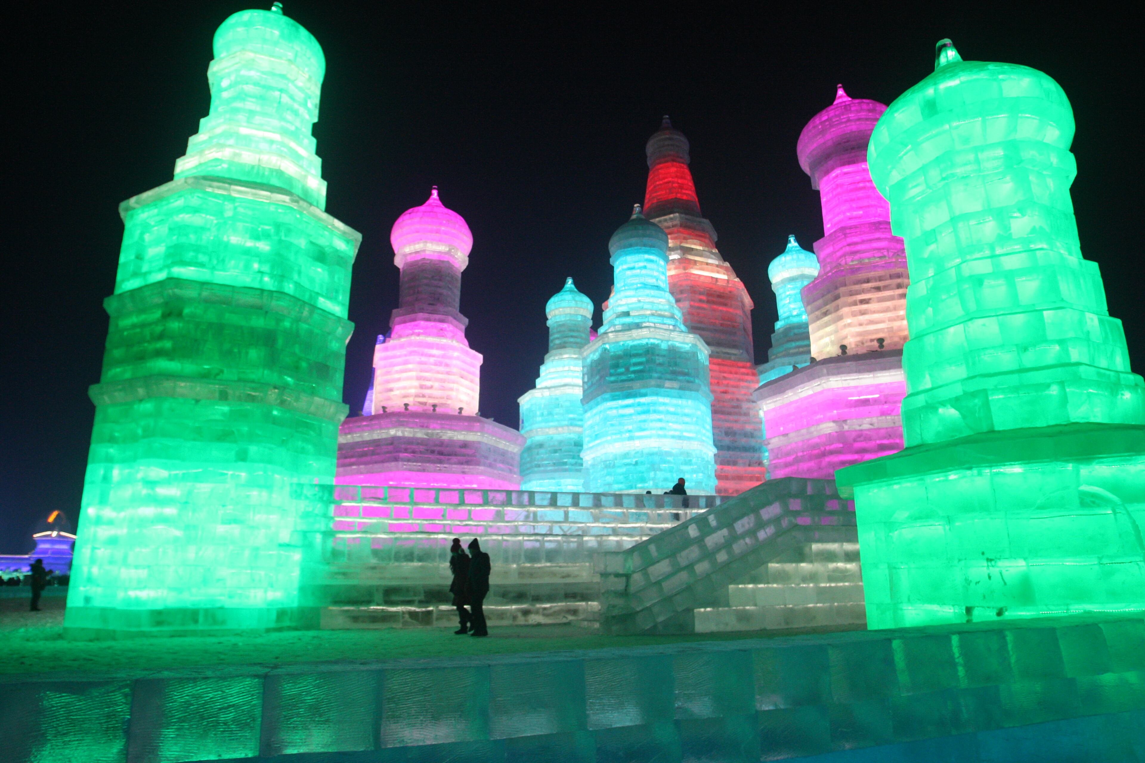 HARBIN, CHINA - DECEMBER 22: (CHINA OUT) Tourists visit the 17th Harbin Ice And Snow World during its test run on December 22, 2015 in Harbin, China. The event will run from December 25, 2015 to February 25, 2016. (Photo by ChinaFotoPress/ChinaFotoPress via Getty Images)