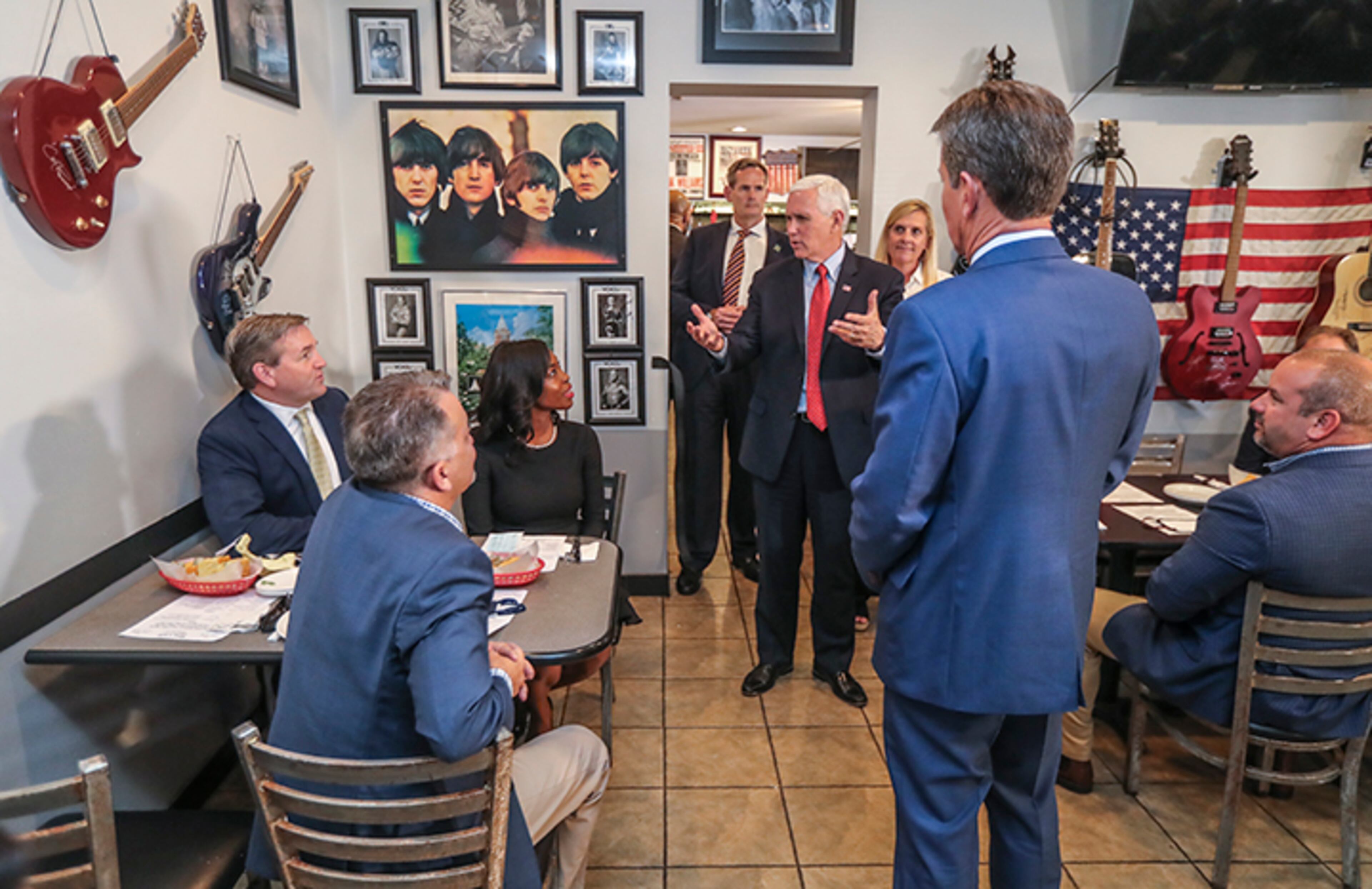 Vice President Mike Pence (center) and Gov. Brian Kemp (right) at the Star Cafe in Atlanta on Friday, May 22, 2020. (Photo: JOHN SPINK/JSPINK@AJC.COM)