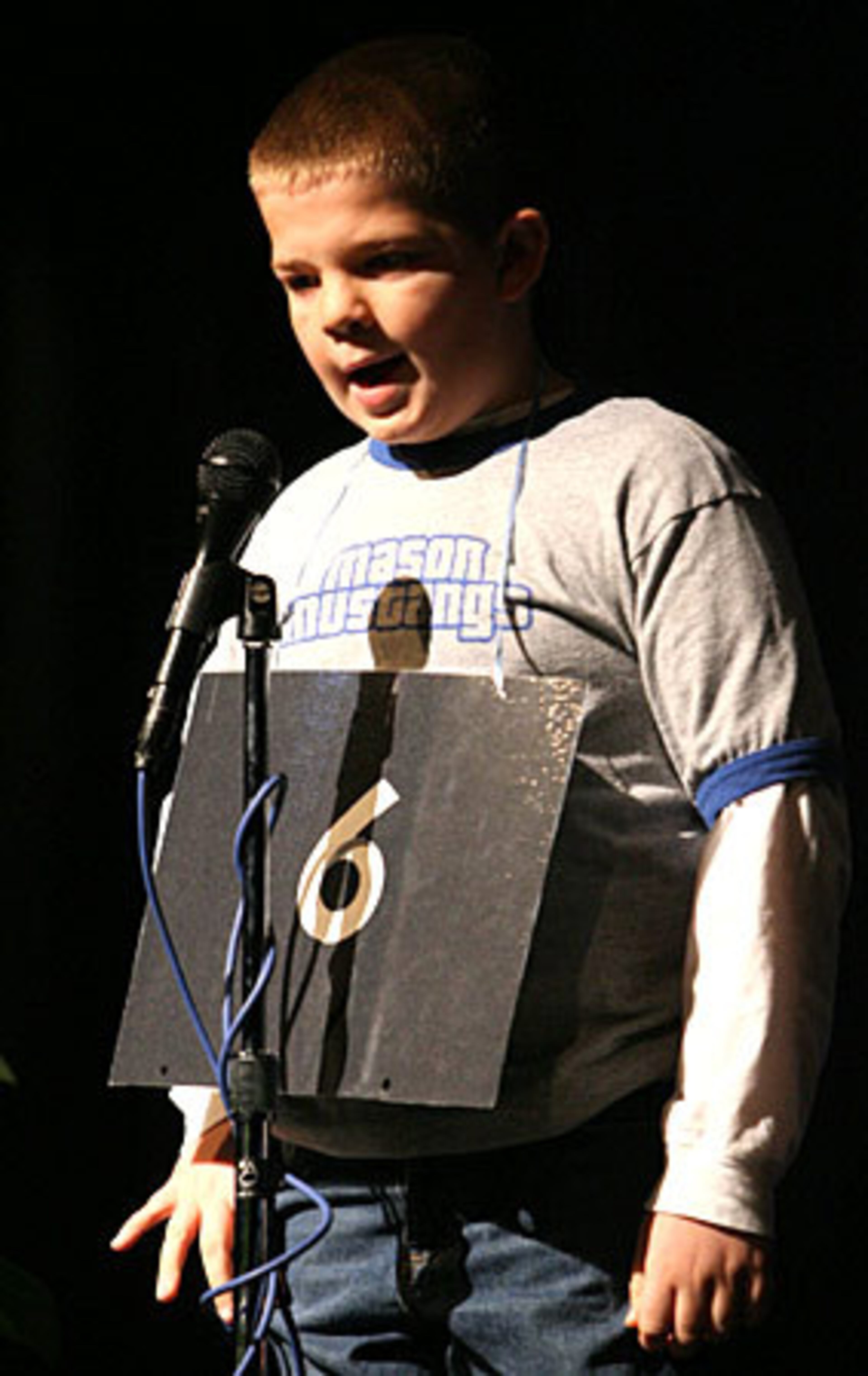 J.J. Stewart, a student at Mason Elementary, spells a complicated word.