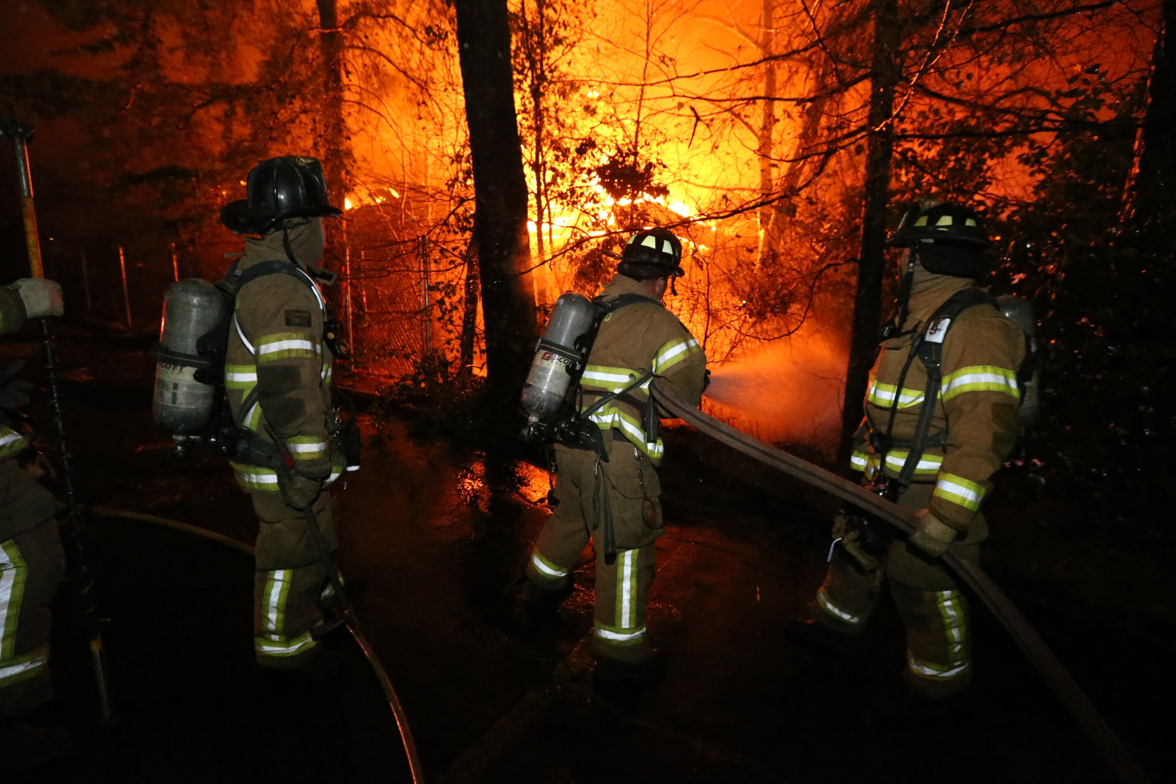 DeKalb County firefighters were battling a huge fire early Tuesday in an office building on Memorial Drive. The blaze broke out before 5 a.m. in a two-story office building in the 4100 block of Memorial Drive, just inside I-285 near Covington Highway. JOHN SPINK/JSPINK@AJC.COM