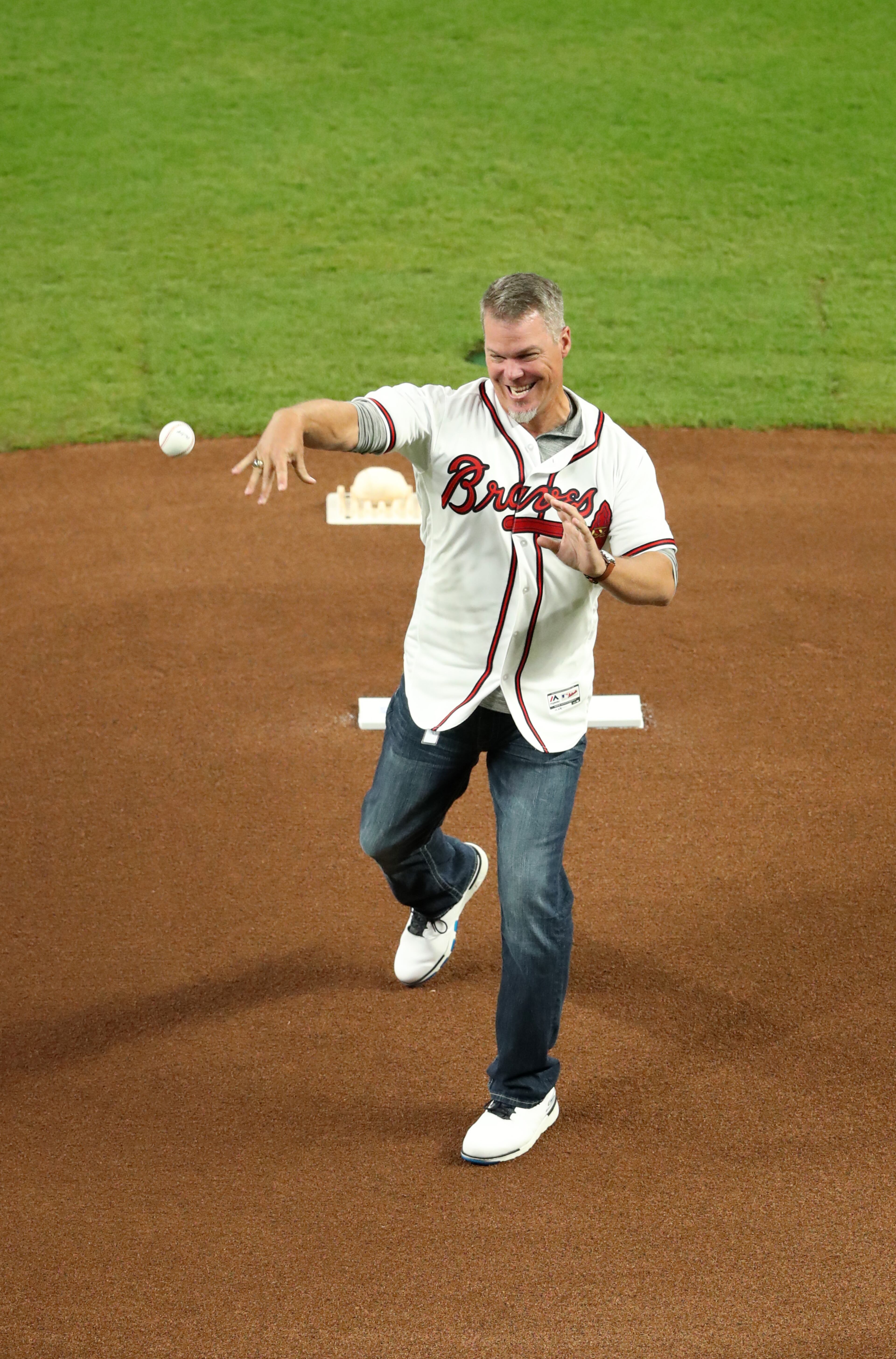 October 7, 2018 - Atlanta: Former Atlanta Braves third baseman Chipper Jones throws out the first pitch before the start of their game against the Los Angeles Dodgers in Game 3 of a National League Division Series baseball game Sunday, October 7, 2018, in Atlanta. (JASON GETZ/SPECIAL TO THE AJC)