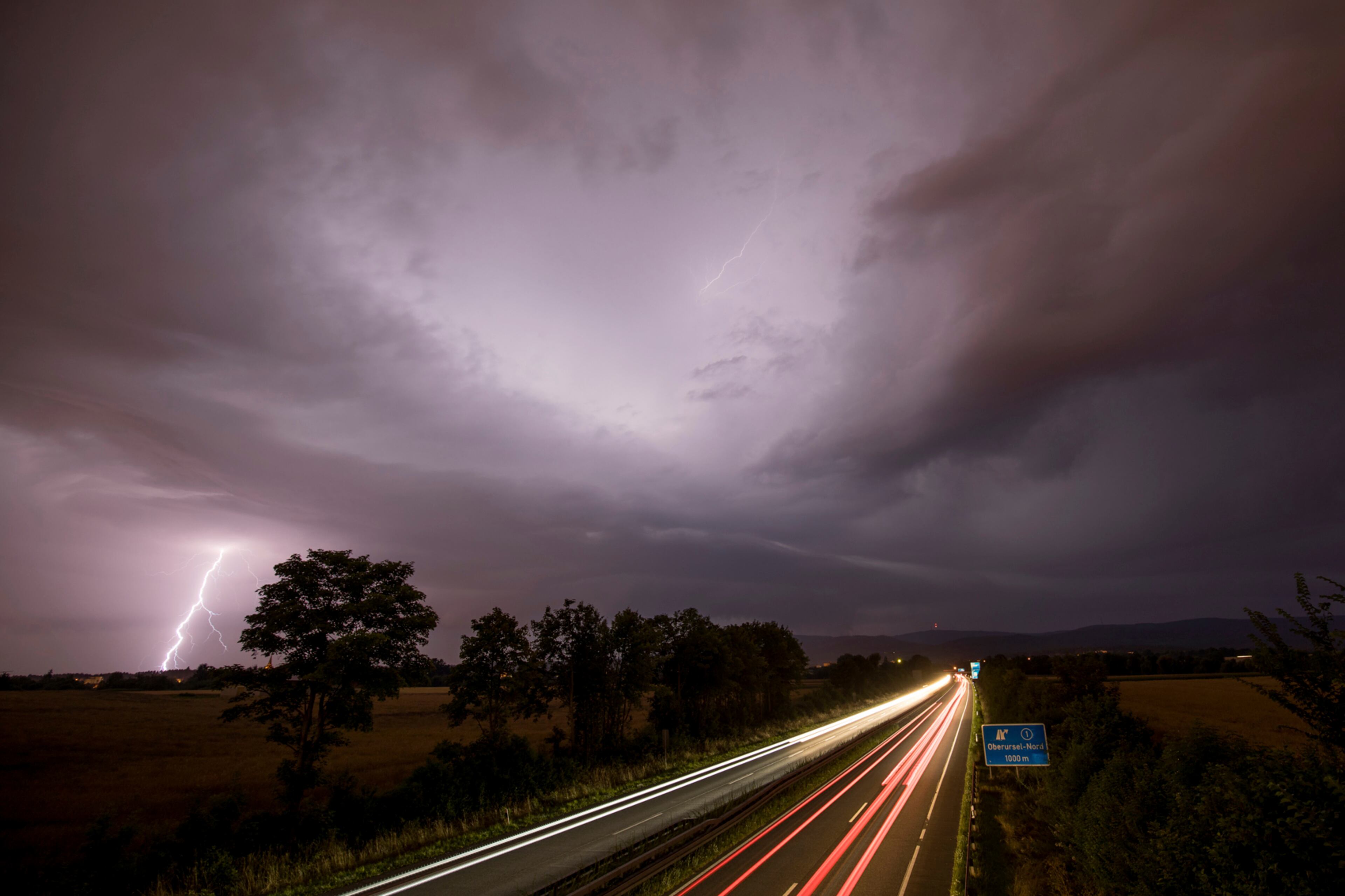 This July 22, 2017 photo taken with long time exposure shows lightnings during thunderstorms near the highway 661 in Oberursel, near Frankfurt, Germany. (Jan Eifert/dpa via AP)