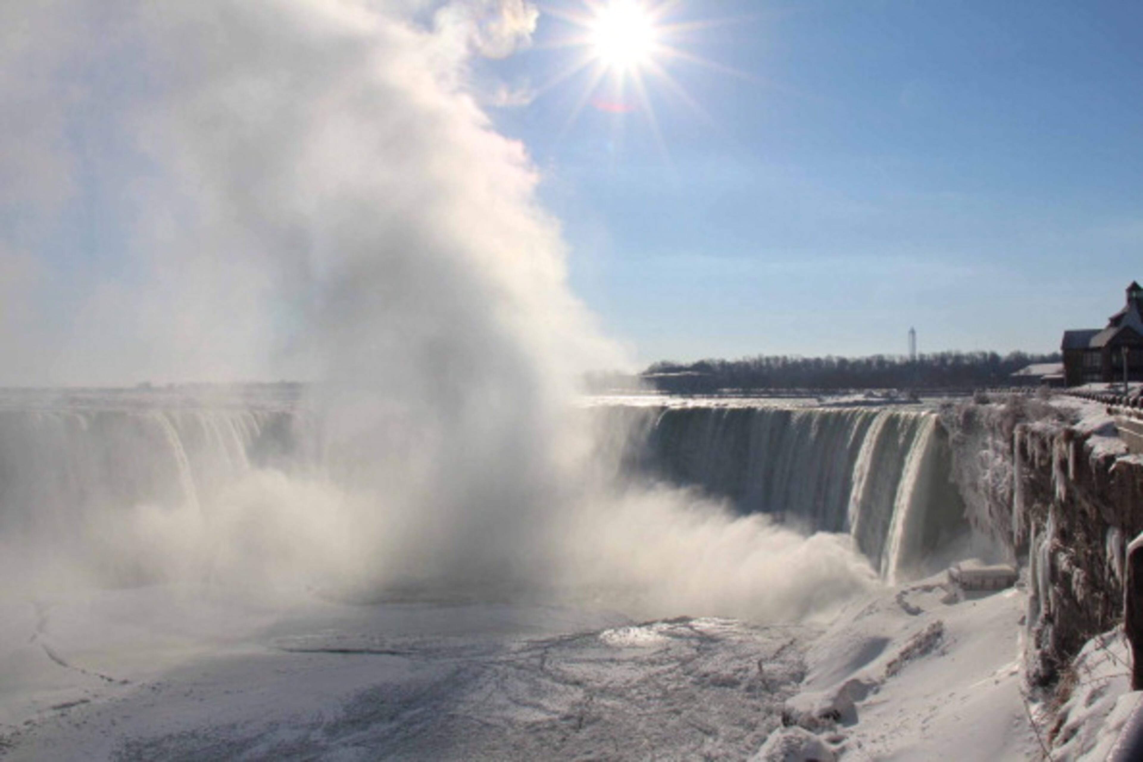 ONTARIO, CANADA - JANUARY 9: A view of the Niagara Falls frozen over due to the extreme cold weather, Ontario, Canada, January 9, 2014. The Polar Vortex brought record cold temperatures to United States and Canada. (Photo by Seyit Aydogan/Anadolu Agency/Getty Images)