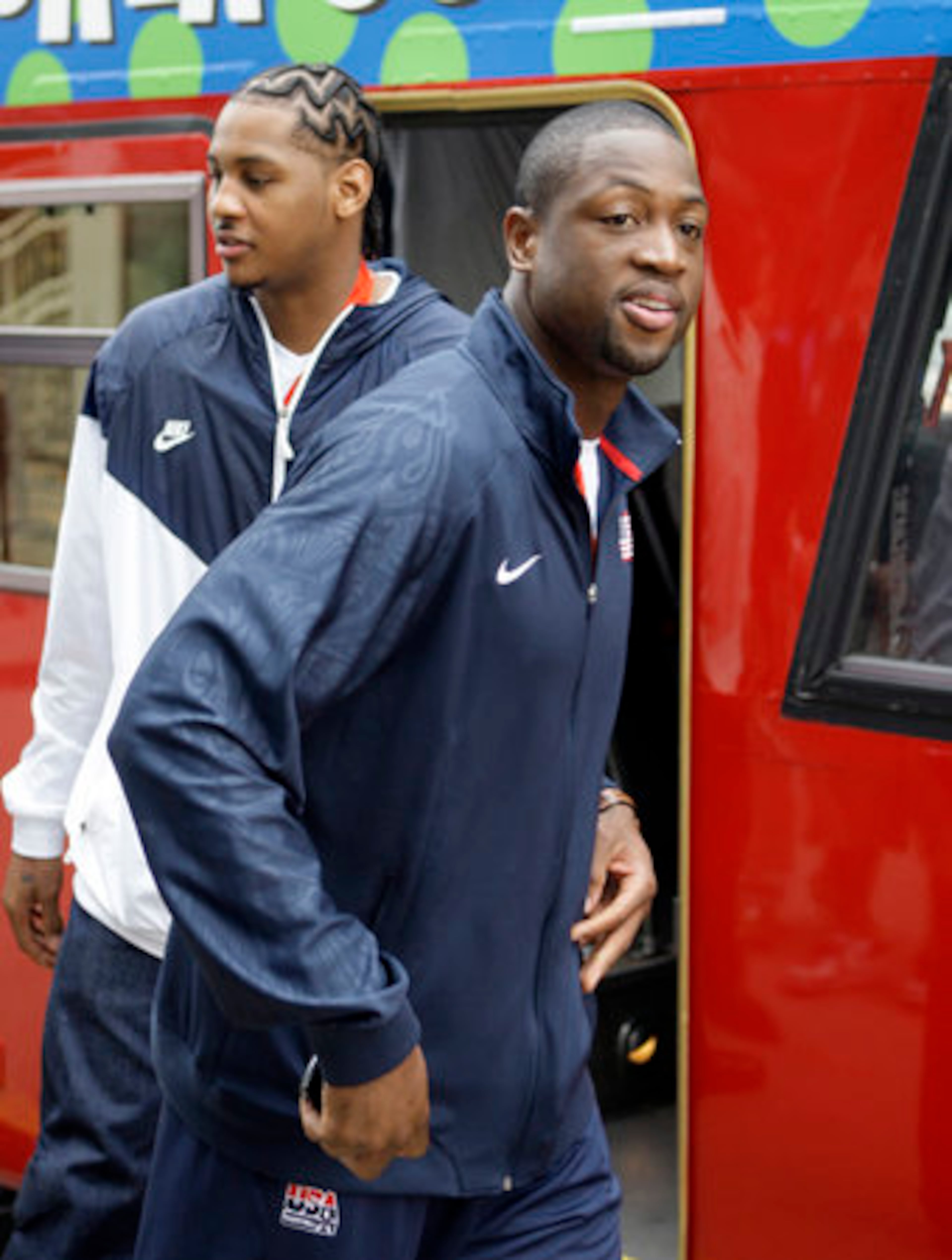Olympic men's gold medal basketball players Dwyane Wade, right, and Carmelo Anthony arrive for the taping.