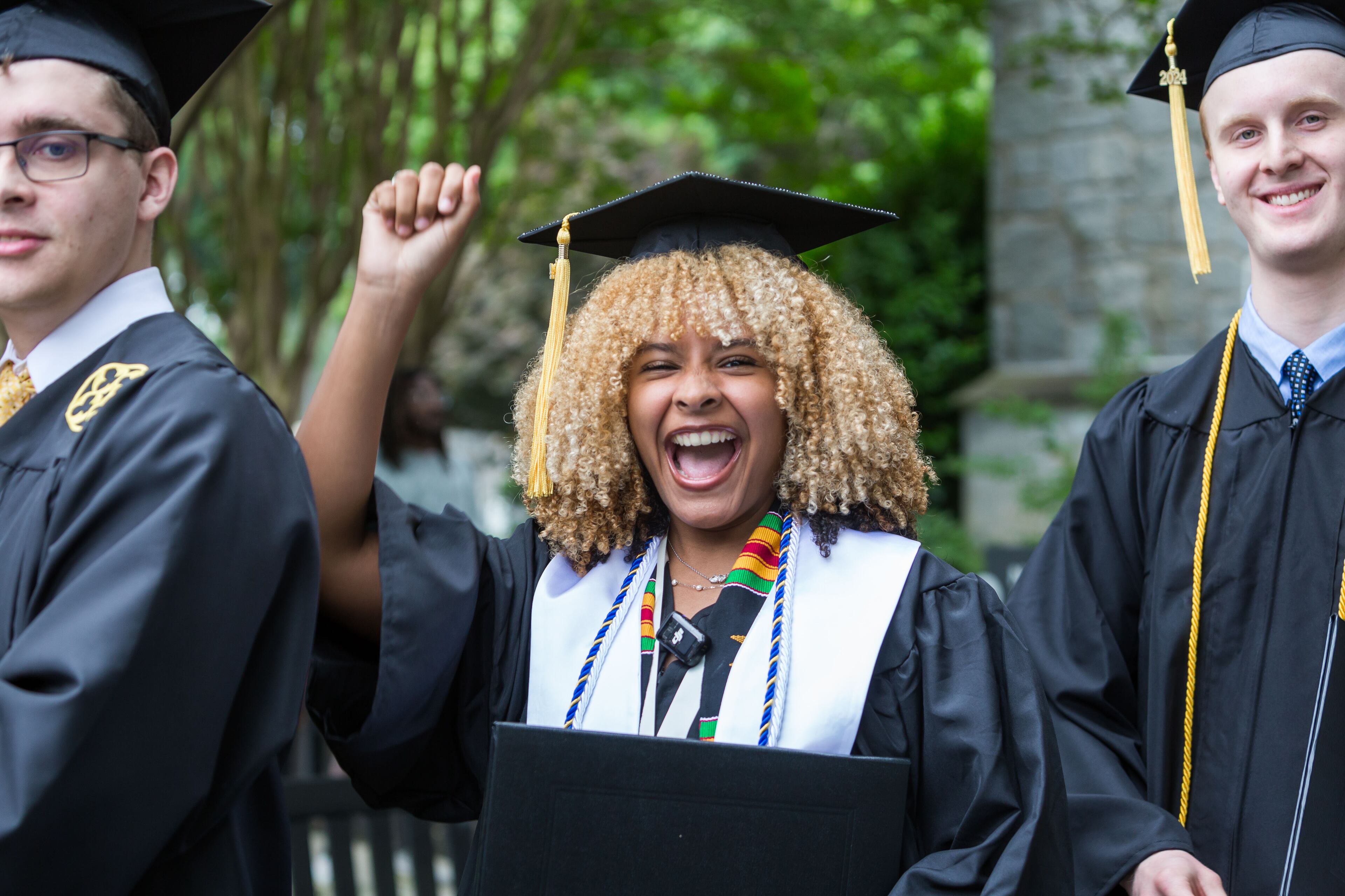 A student celebrates during the Oglethorpe University commencement ceremony on May 18, 2024. Photo Credit: Henry Bradley/Highlight Media.