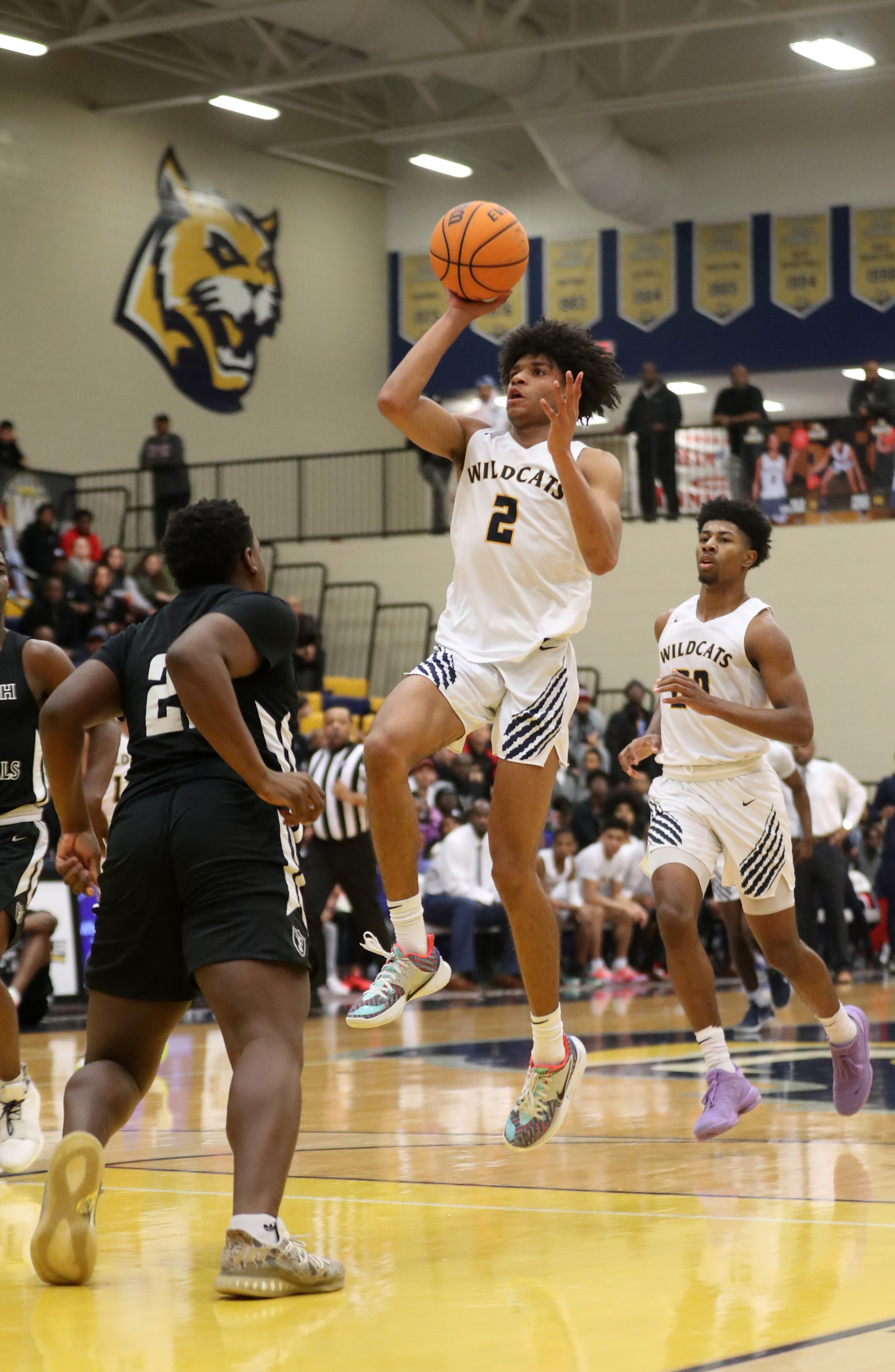 Wheeler guard Prince Davies (2) attempts a shot against Shiloh in the first half of Thursday's game. (Jason Getz/Special to the AJC)