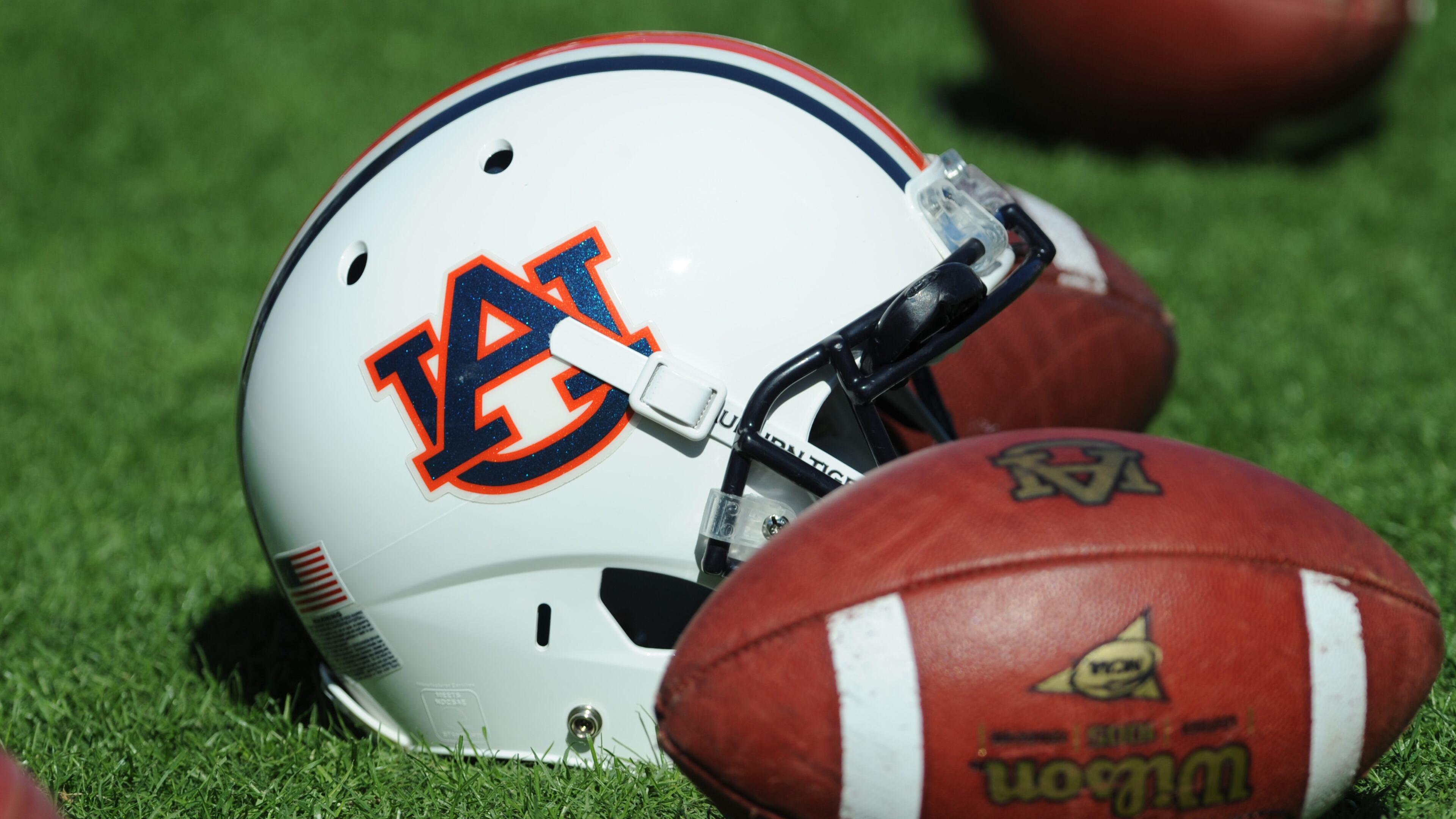 A helmet and footballs of the Auburn Tigers are on the field before play against the Chattanooga Mocs November 6, 2010 at Jordan-Hare Stadium in Auburn, Alabama. (Photo by Al Messerschmidt/Getty Images)