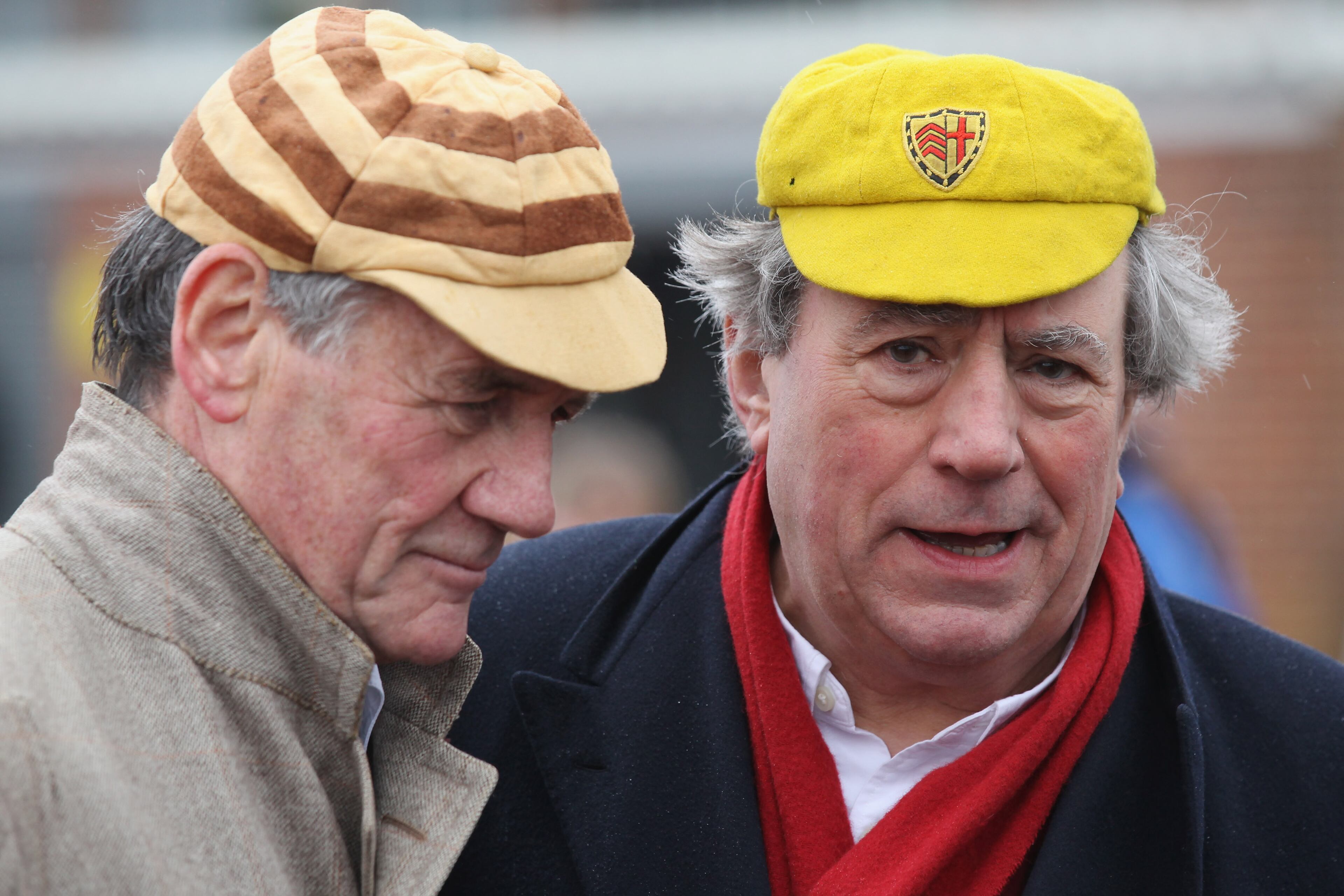 LONDON, ENGLAND - MARCH 03: Former 'Monty Python' actors Michael Palin (L) and Terry Jones attend a 'Hopathon' world record attempt on Hampstead Heath athletics track on March 3, 2012 in London, England. The comic actors joined participants completing a 400 metre hop to mark the 35 year anniversary of their 'Ripping Yarns' television series which featured a 30 mile hop in the episode 'Tomkinson's School Days'. (Photo by Oli Scarff/Getty Images)