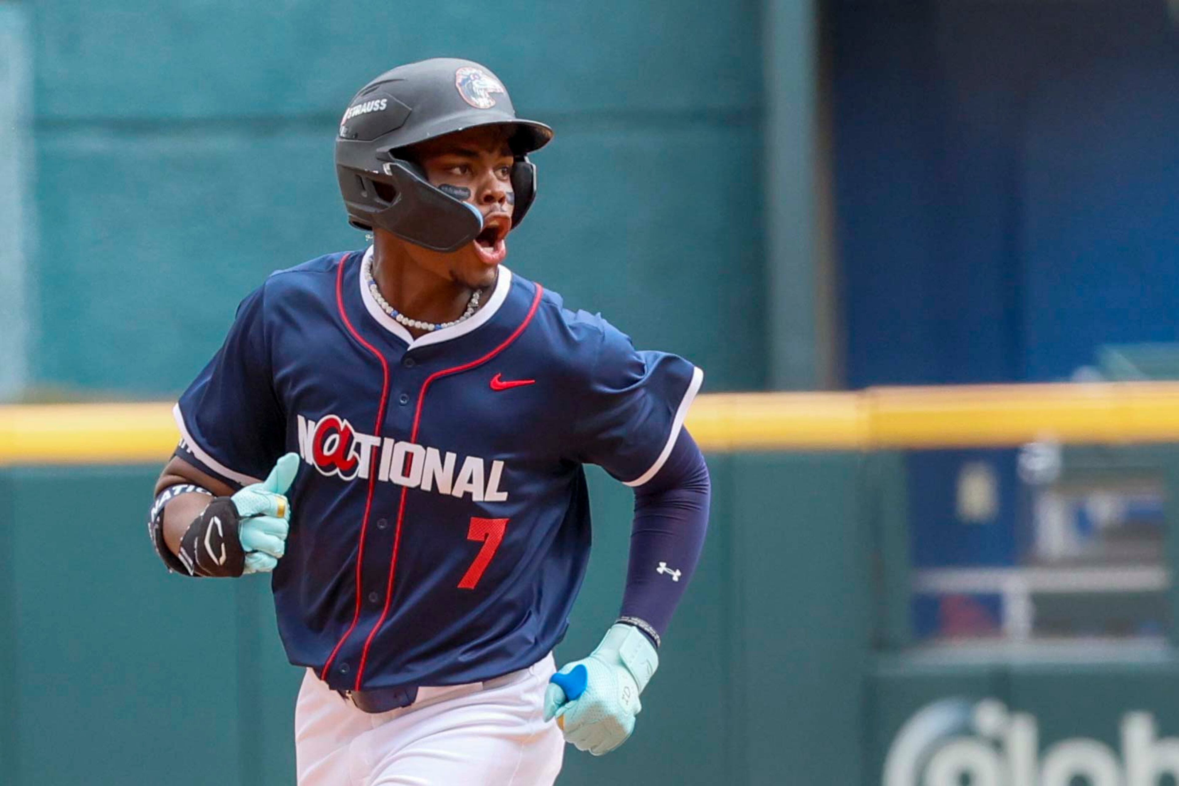 National League outfielder Josue De Paula (7) of the Los Angeles Dodgers reacts as he rounds the bases after his three-run home run during the MLB All-Star Futures Game at Truist Park on Saturday, July 12, 2025, in Atlanta.
(Miguel Martinez/ AJC)