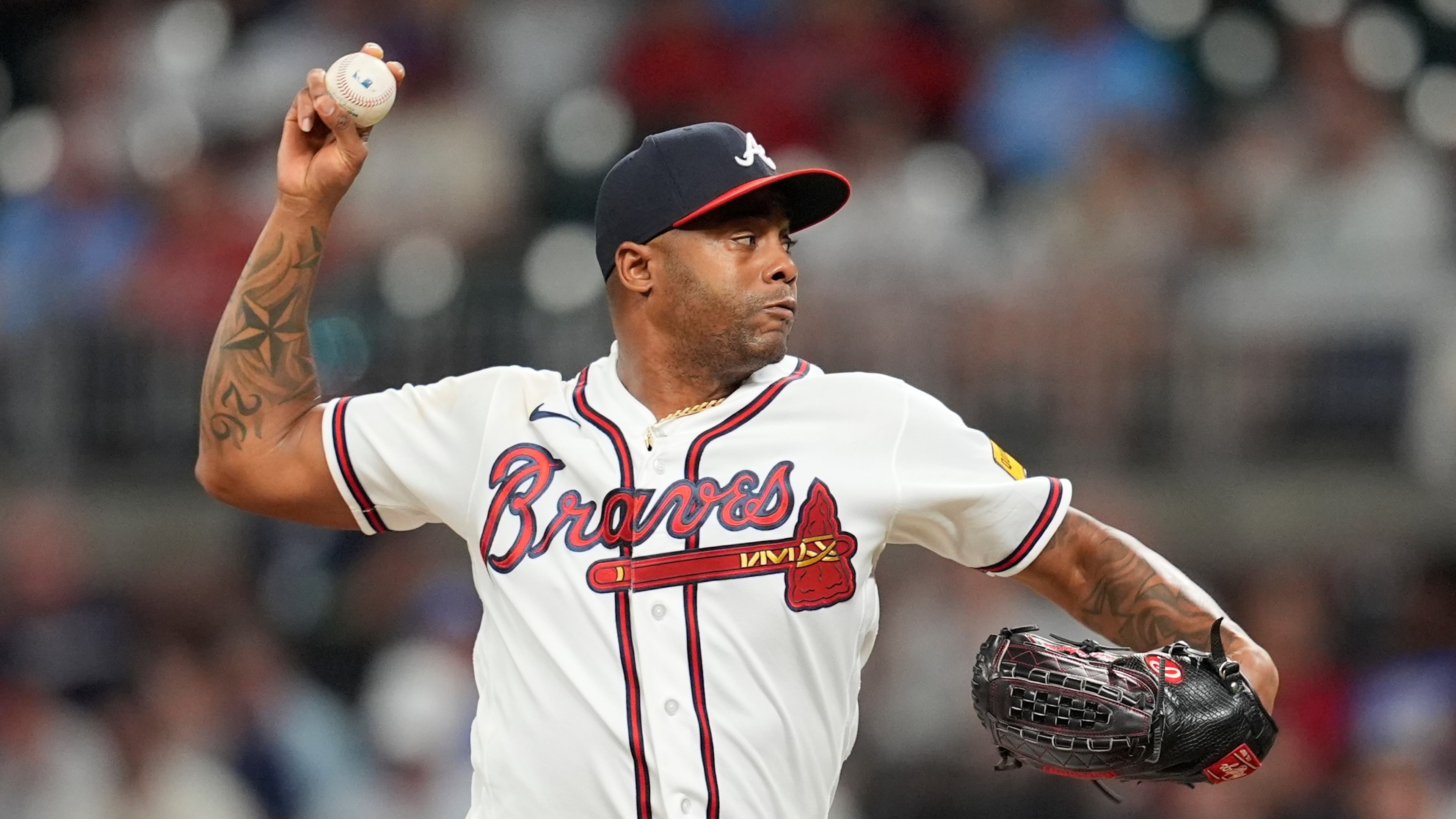 Atlanta Braves pitcher Raisel Iglesias (26) works in the nineth inning of a baseball game against the Miami Marlins, Tuesday, Aug. 4, 2026, in Atlanta. (AP Photo/Mike Stewart)