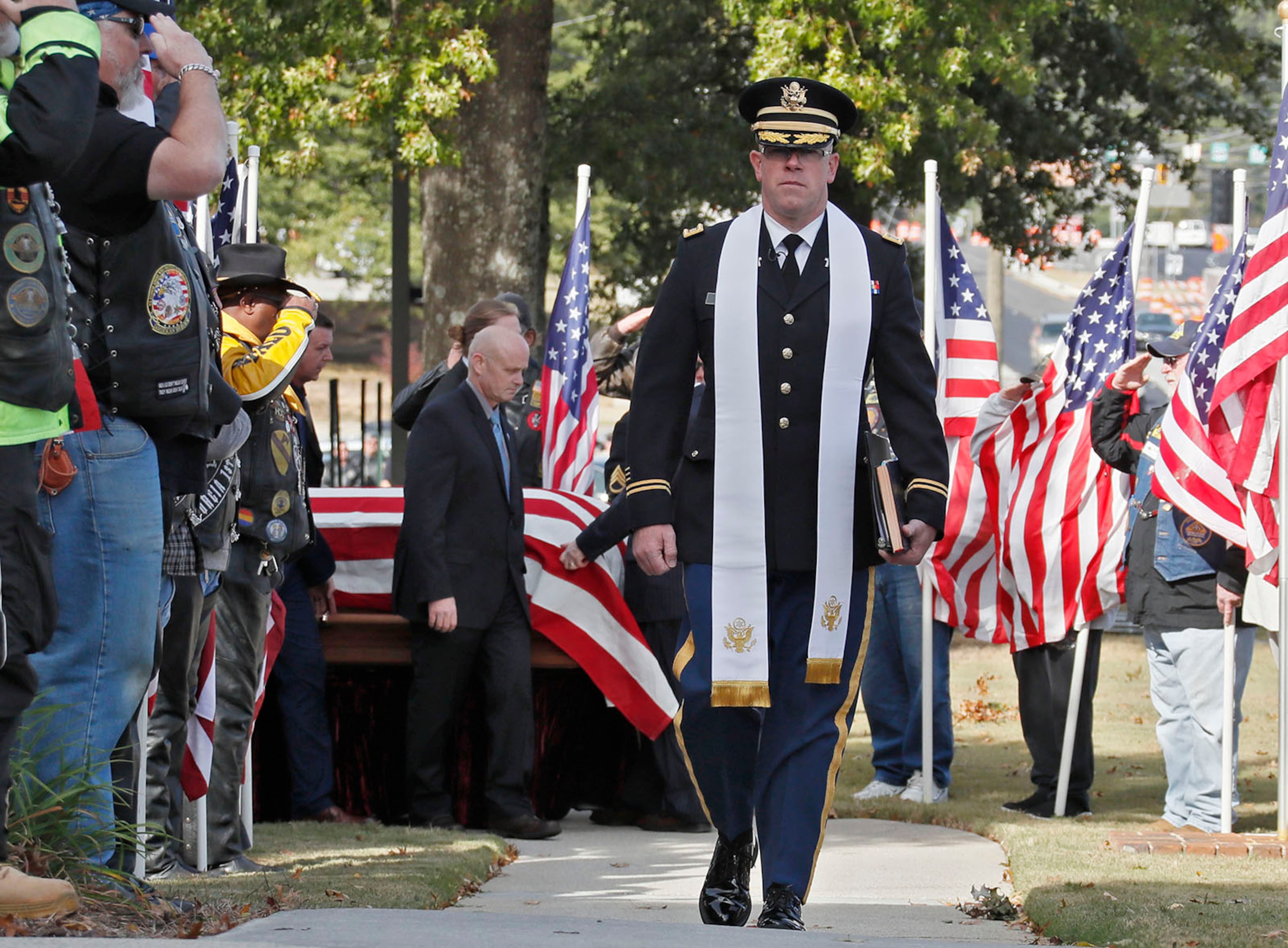 October 18, 2019 - Snellville - A Chaplain leads the procession as pall bearers carry the casket into the church. The funeral for Master Sgt. Mark Allen was held. Friday at the First Baptist Church of Snellville. Allen died Saturday, ten years after he was shot while searching for a soldier who deserted his post in Afghanistan. He was 46. Bob Andres / robert.andres@ajc.com