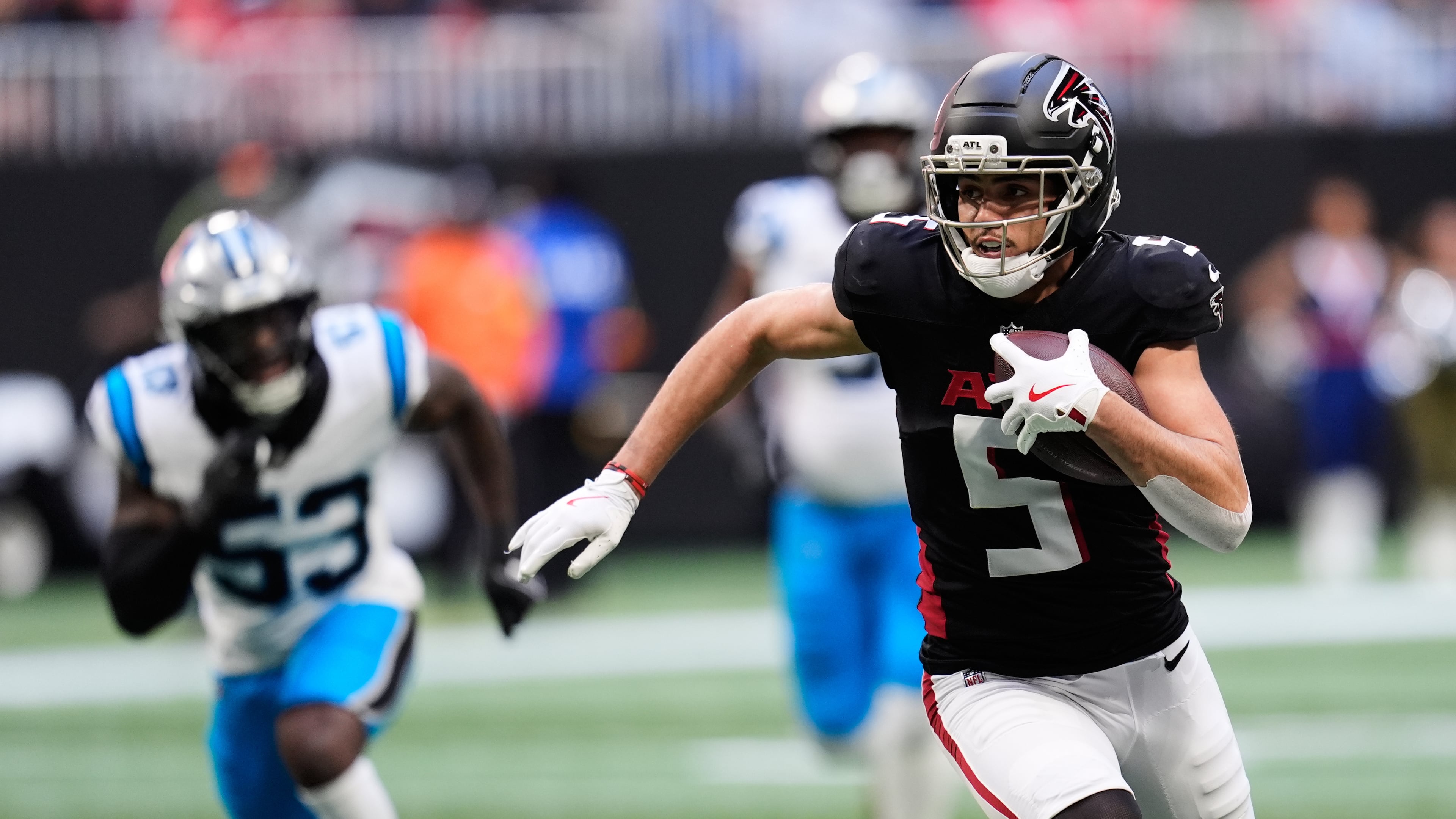 FILE - Atlanta Falcons wide receiver Drake London (5) carries against the Carolina Panthers in the first half of an NFL football game, Nov. 16, 2025, in Atlanta. (AP Photo/Mike Stewart, File)