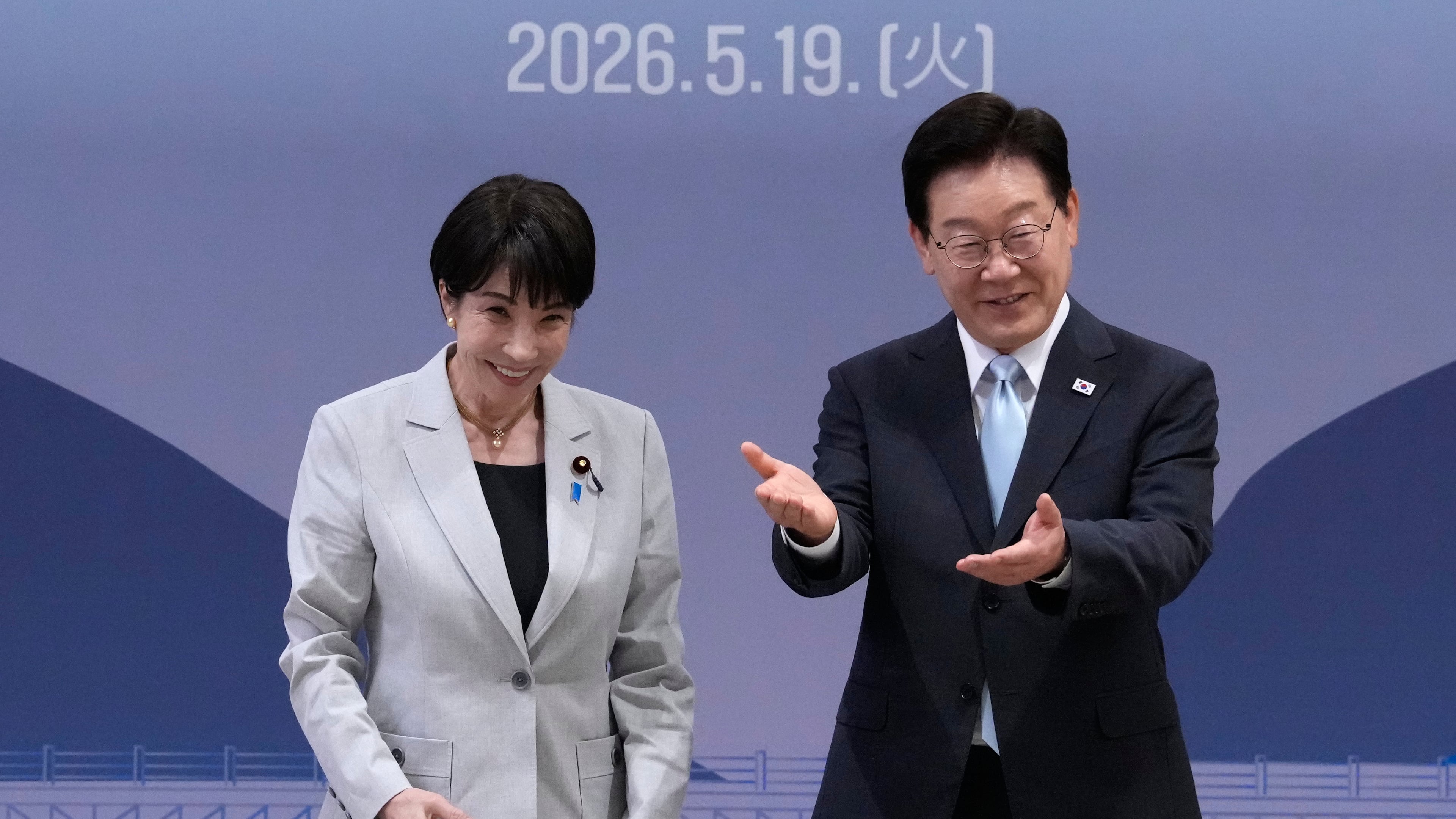 Japan's Prime Minister Sanae Takaichi, left, and South Kore's President Lee Jae Myung react during their meeting in Andong, South Korea, Tuesday, May 19, 2026. (AP Photo/Ahn Young-joon, Pool)