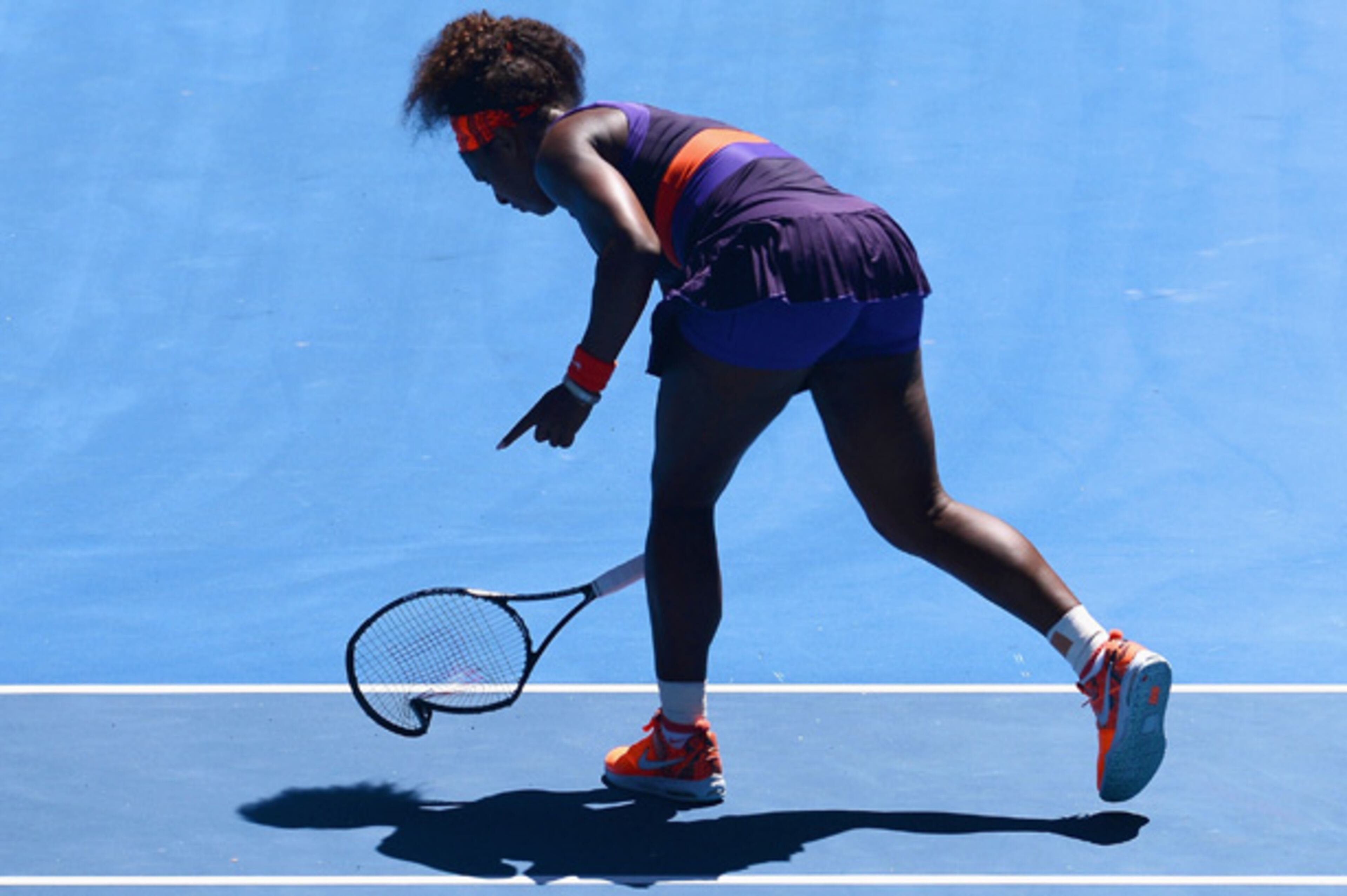 ... But she wasn't done. In one swift motion she raised the racket again ..