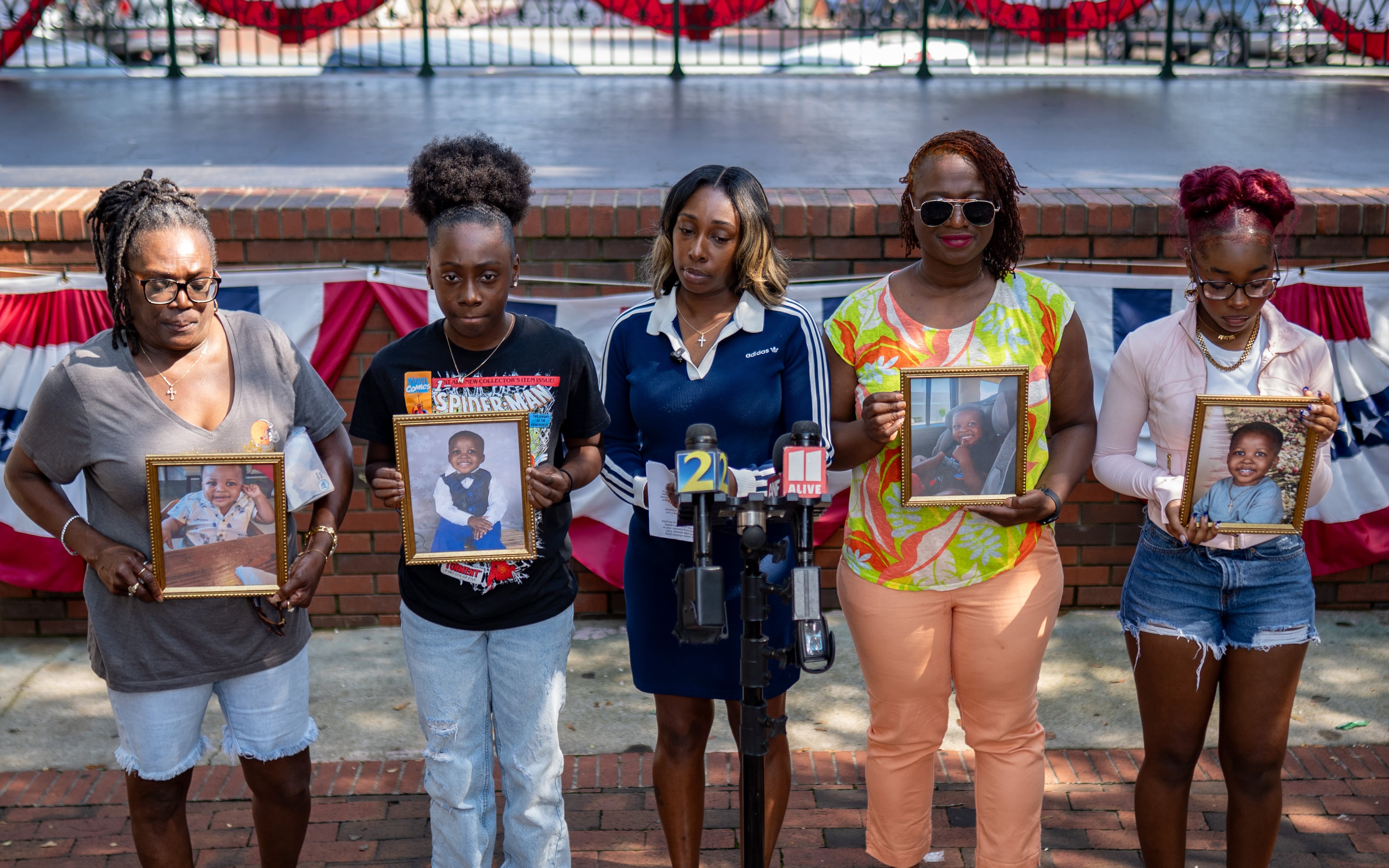 The family of Messiah Harris, a 2-year-old boy found dead in Marietta, speaks to the media Wednesday, Aug. 12, 2026, in Marietta. (Ben Hendren for the AJC)