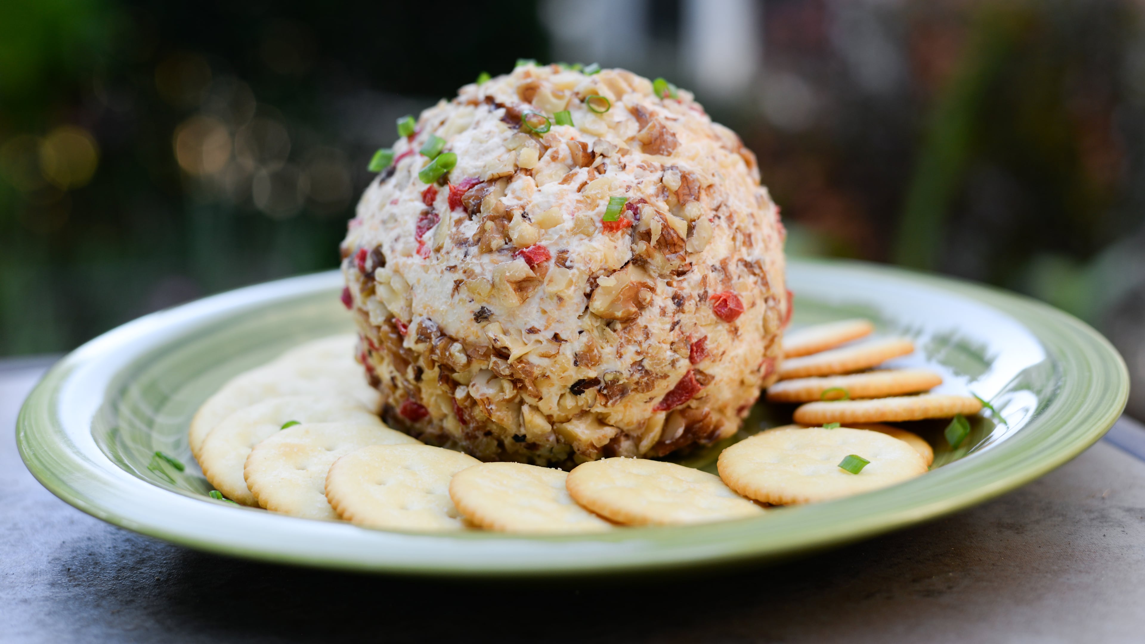The party cheese ball was a staple of mid-20th century entertaining that fell out of favor in the late '80s. But it's back in style again. (Candy Hom for the AJC)