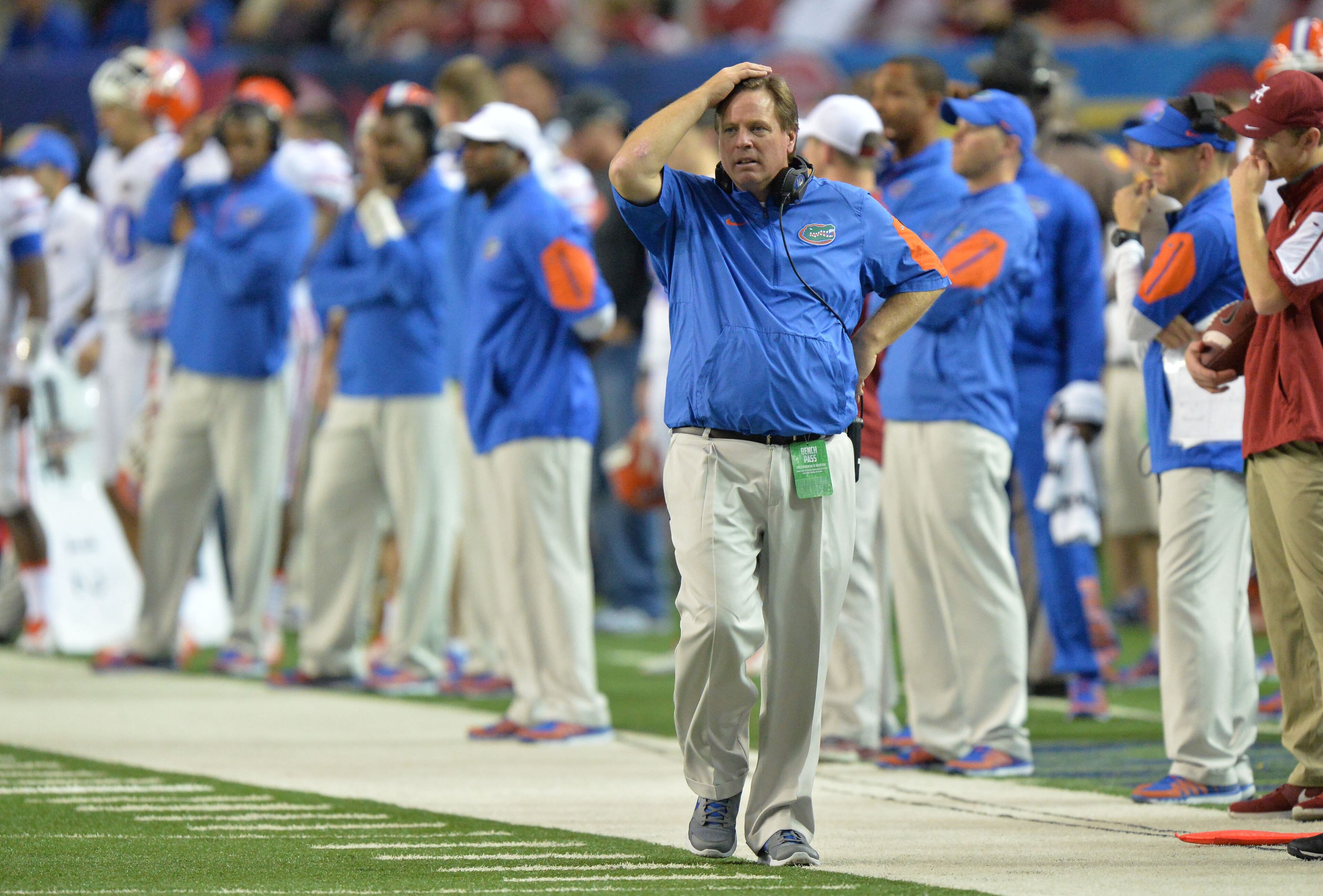 December 5, 2015 Atlanta - Florida Gators head coach Jim McElwain reacts at the end of the 4th quarter during Alabama's 29 - 15 win over Florida in the 2015 SEC Championship at the Georgia Dome on Saturday December 5, 2015. HYOSUB SHIN / HSHIN@AJC.COM