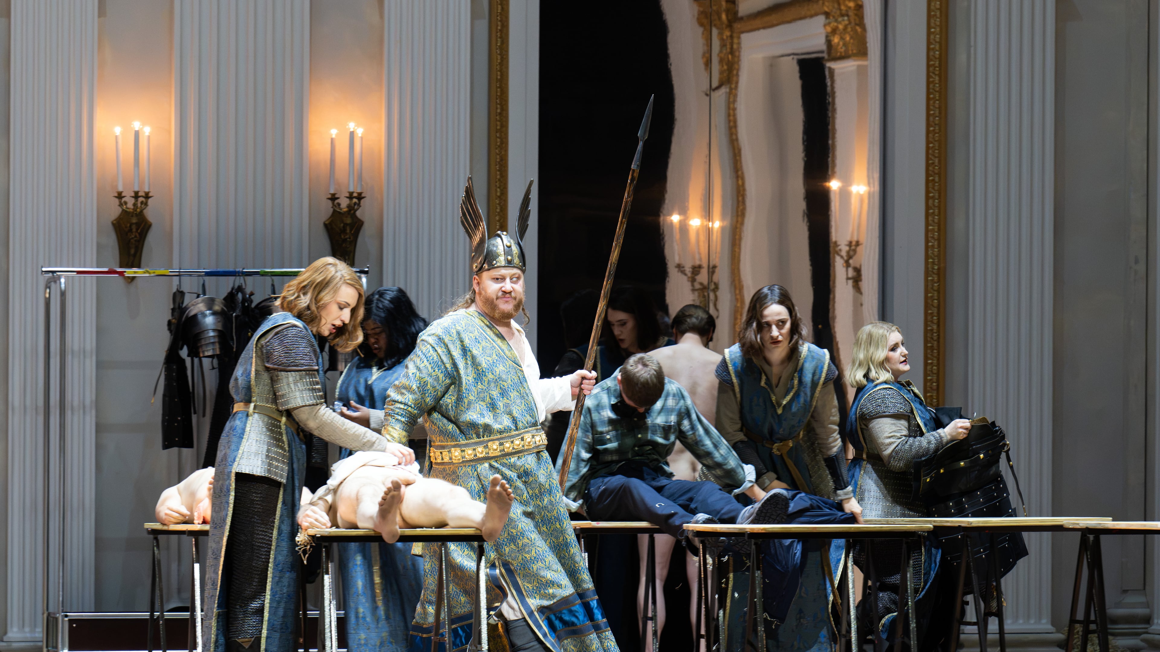 Bass-baritone Nicholas Brownlee portrays Wotan, second left, as he is surrounded by cast members portraying Wotan's Valkyrie daughters, in a production of Richard Wagner’s “Die Walkuere” at the Bavarian State Opera in Munich. (Monika Rittershaus/Bavarian State Opera via AP)