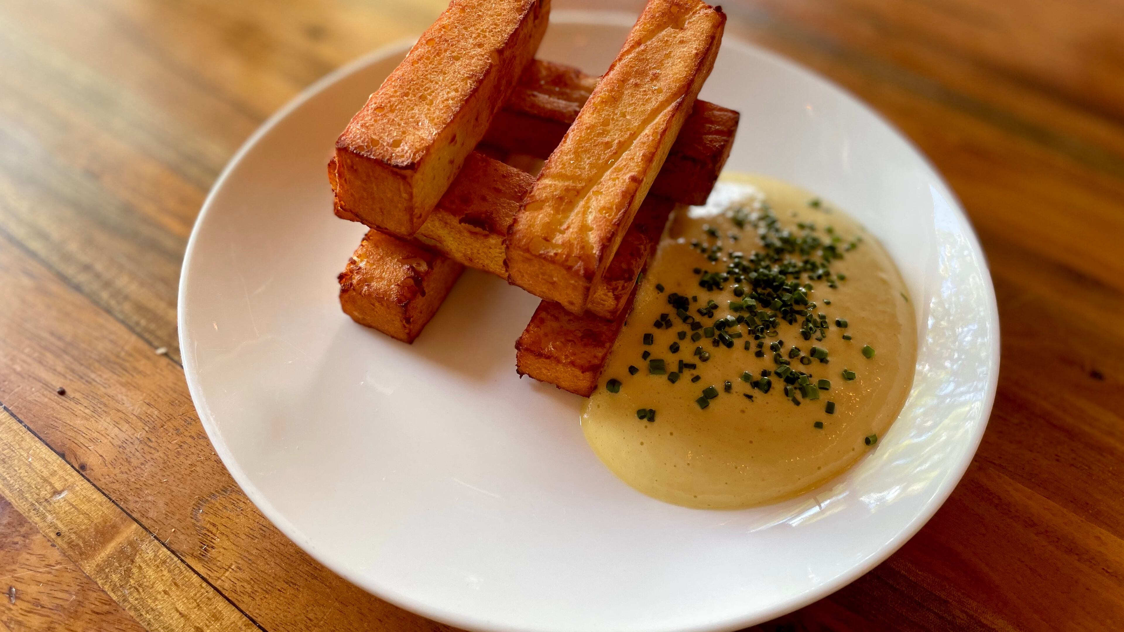Potato Macaire is a craveable delicacy at Staplehouse. Angela Hansberger for The Atlanta Journal-Constitution
