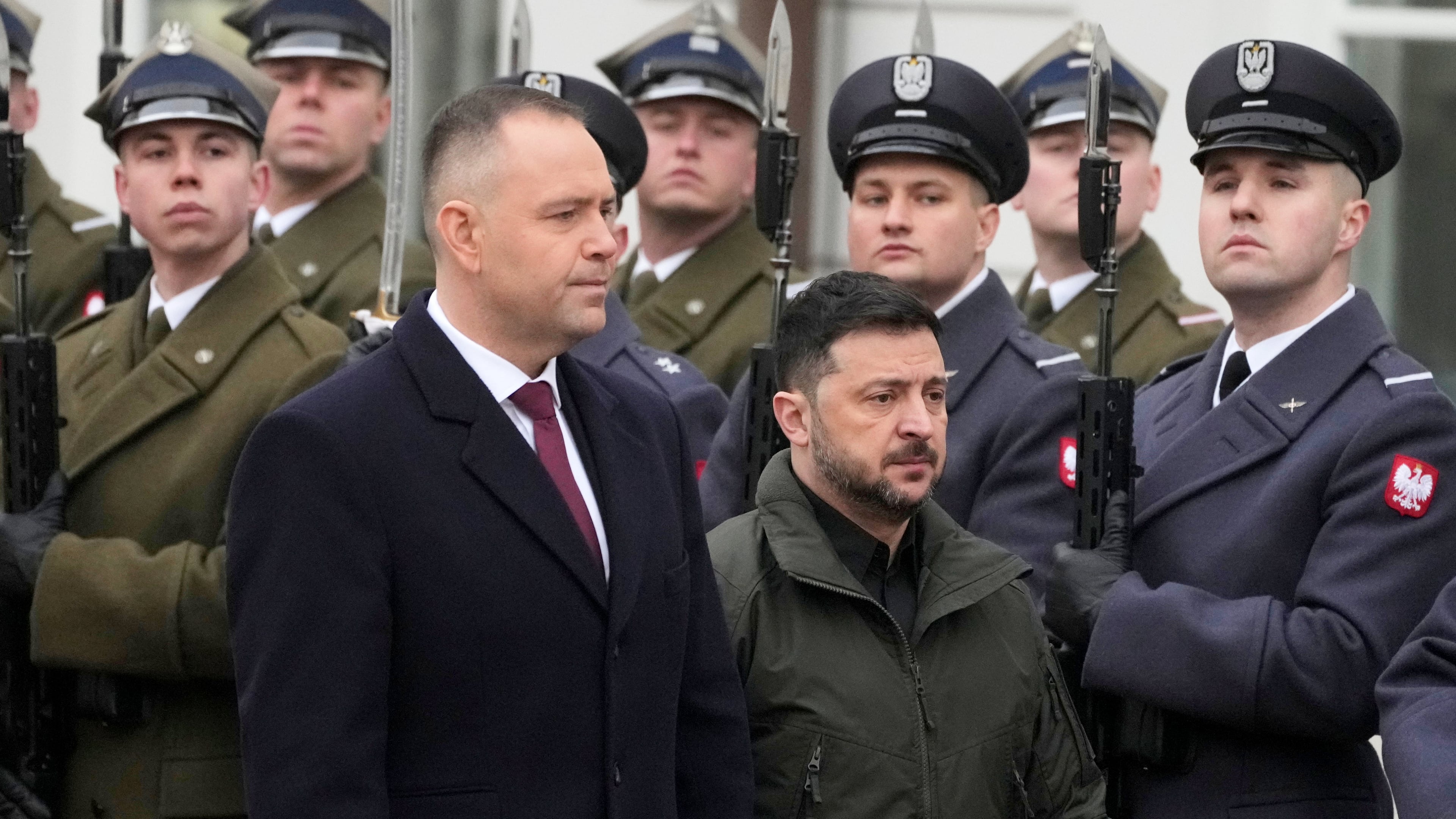 FILE - Polish President Karol Nawrocki, left, and Ukrainian President Volodymyr Zelenskyy attend an official welcome ceremony before their meeting at the Presidential Palace in Warsaw, Poland, Dec. 19, 2025. (AP Photo/Czarek Sokolowski, File)