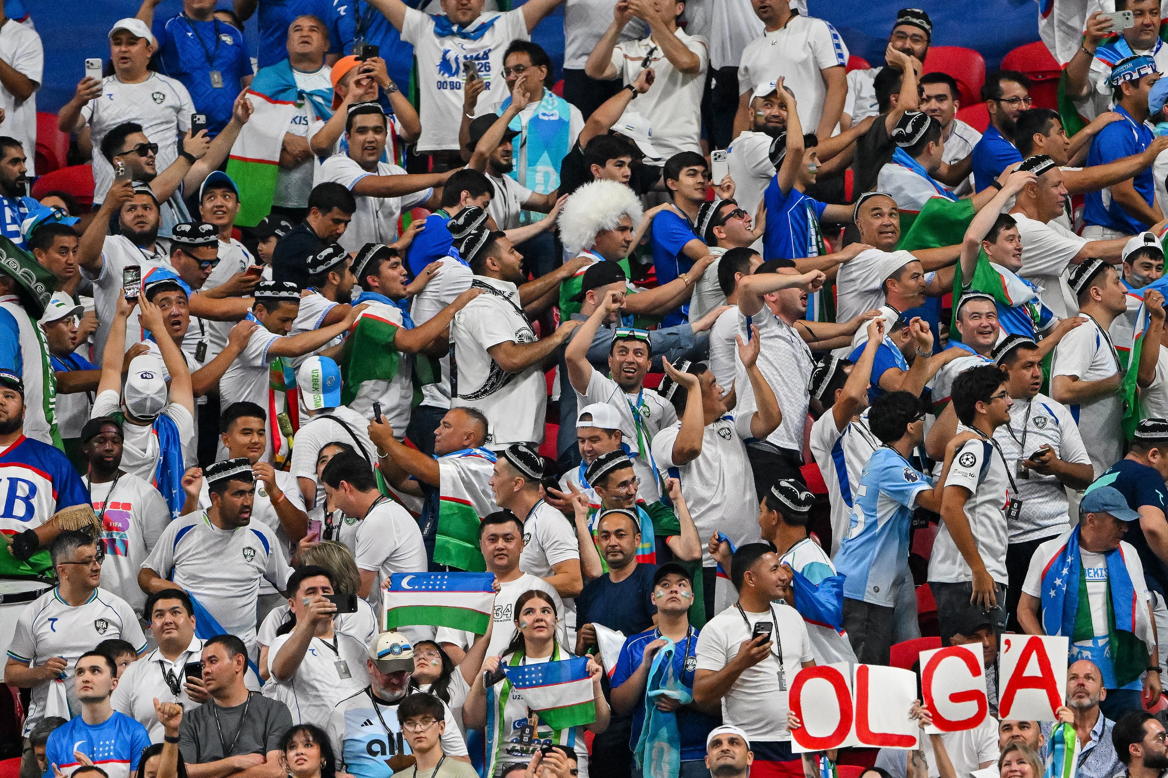 Uzbekistan fans cheer during the first half of a FIFA World Cup match at Atlanta Stadium (Mercedes-Benz Stadium) on Saturday, June 27, 2026, in Atlanta. (Hyosub Shin/AJC)