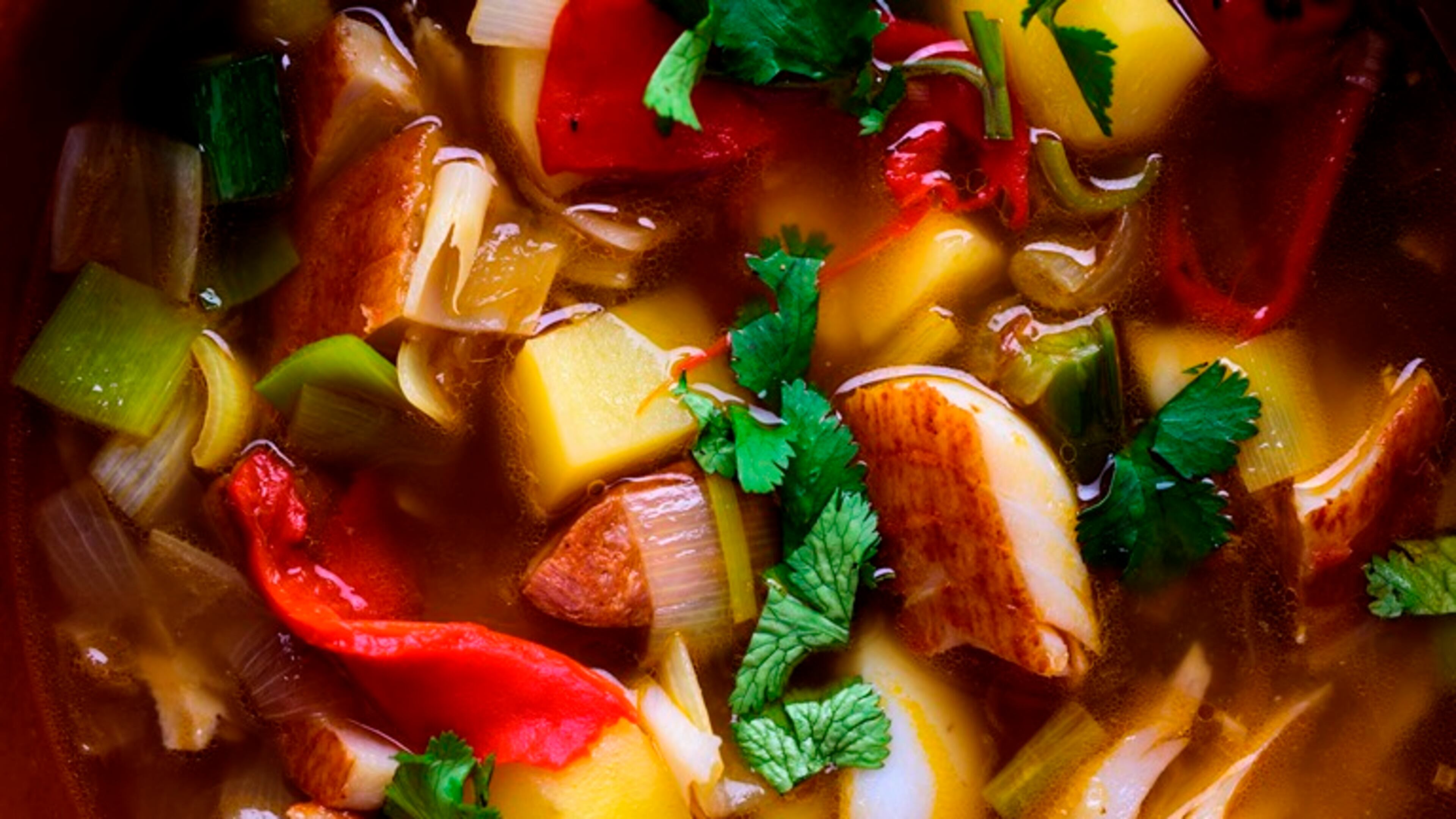 Smoked fish and potato soup with chorizo, piquillo peppers and cilantro, in New York, Nov. 16, 2015. Onions, potatoes, chorizo and smoked fish create “instant umami.”