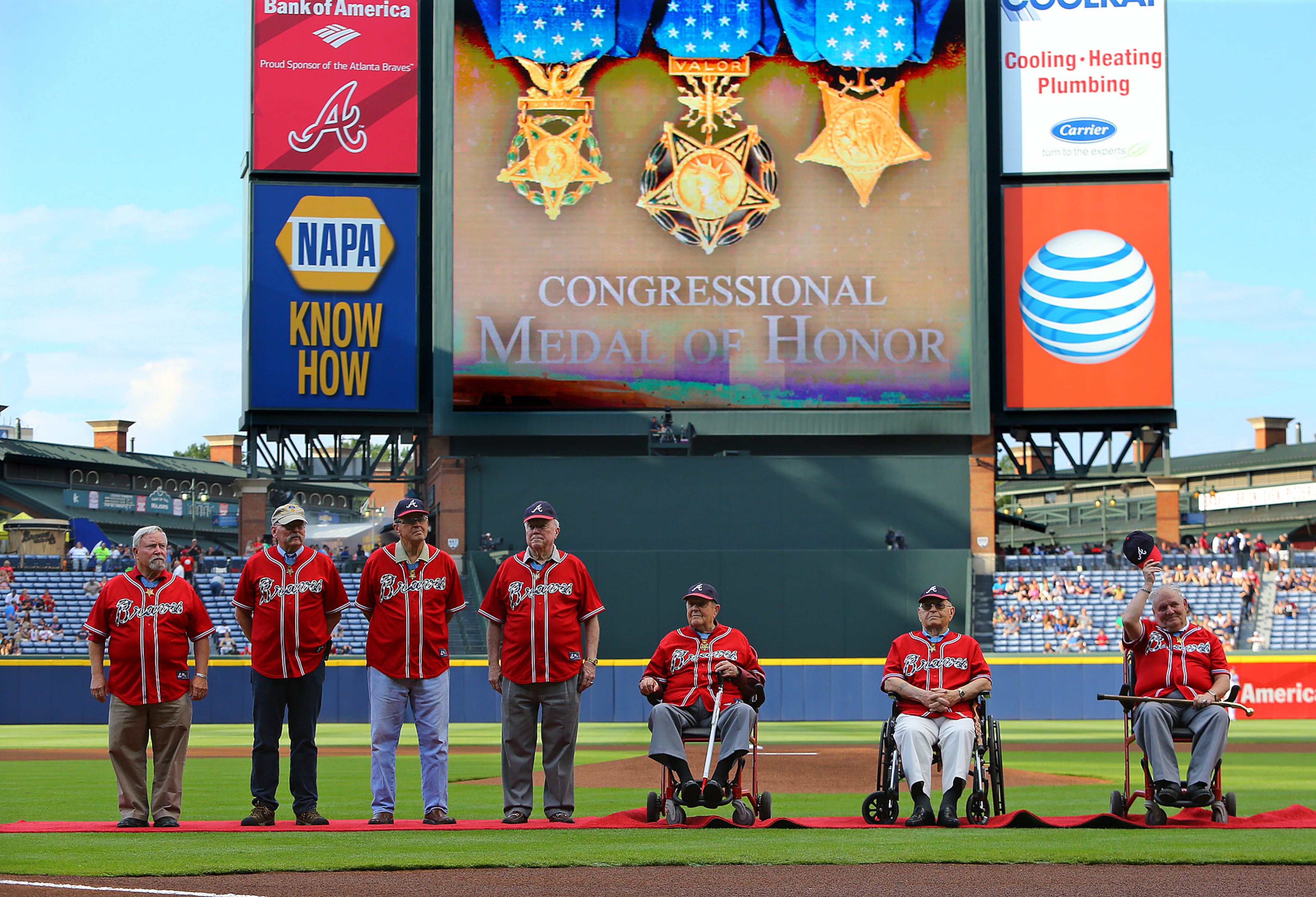 060314 ATLANTA: The Braves honor seven Congressional Medal of Honor recipients Col. Donald Ballard (from left to right), Sgt. Gary Beikirch, Maj Gen Pat Brady, Col. Bruce Crandall, Col. Joe Jackson, Sgt. Maj. Ron Rosser, and Sgt Maj. Ken Stump during a pregame ceremony on Tuesday, June 3, 2014, in Atlanta. The Congressional Medal of Honor is the highest military honor bestowed upon an individual serving in our nation's military. =