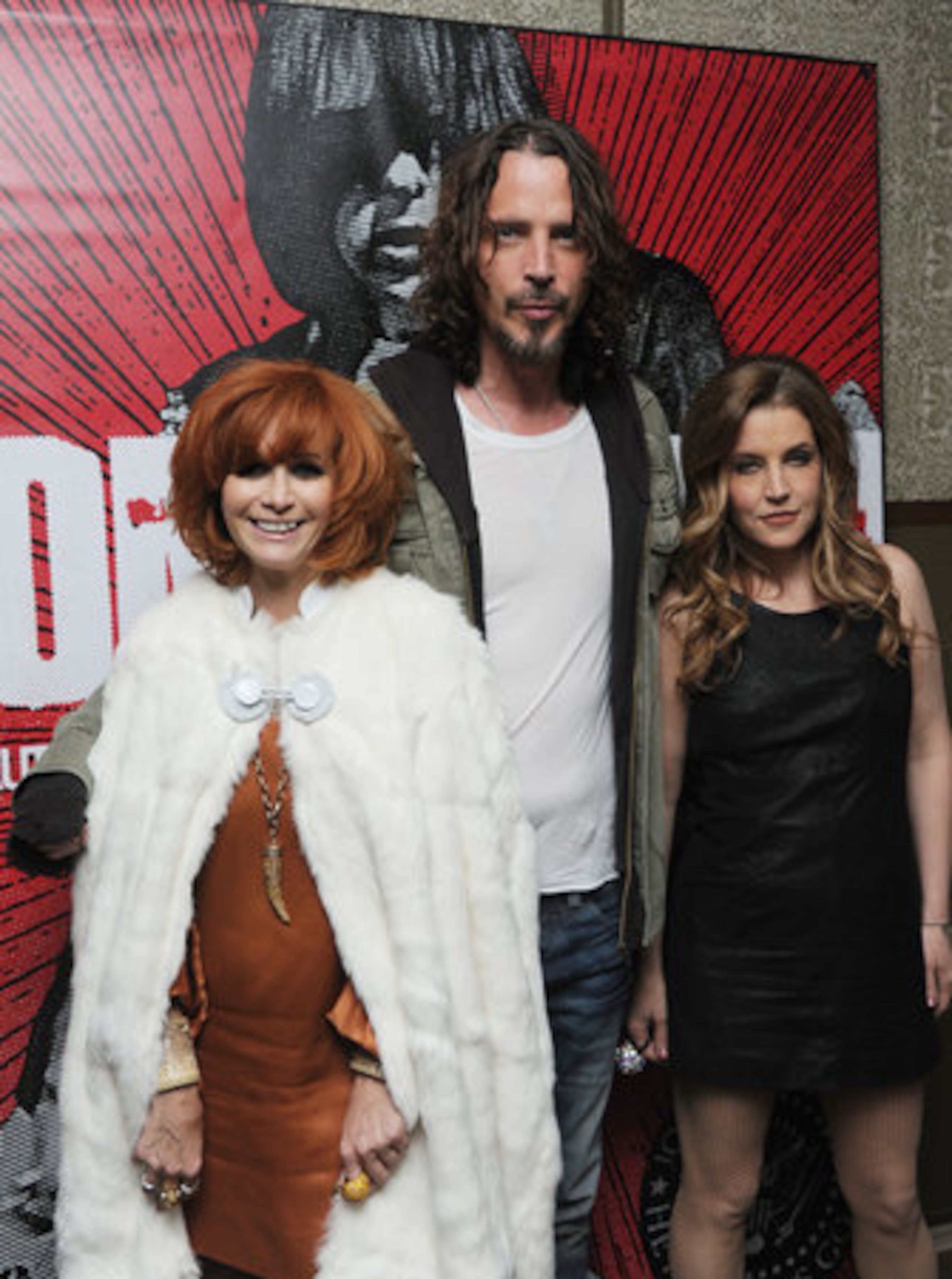 Linda Ramone greets singer Chris Cornell and Lisa Marie Presley.